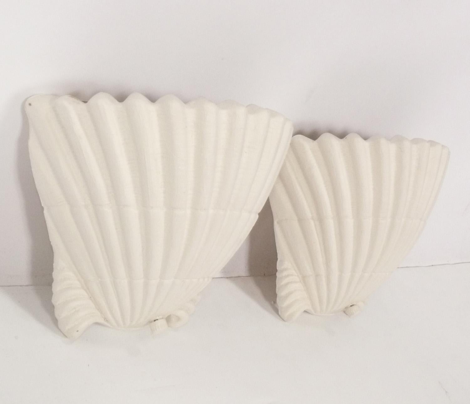 Glamorous Pair of Shell Form Sconces, probably American, circa 1940s. They have been rewired and are ready to use. These are very similar to forms that Frances Elkins imported to the United States from France from the likes of Diego Giacometti for