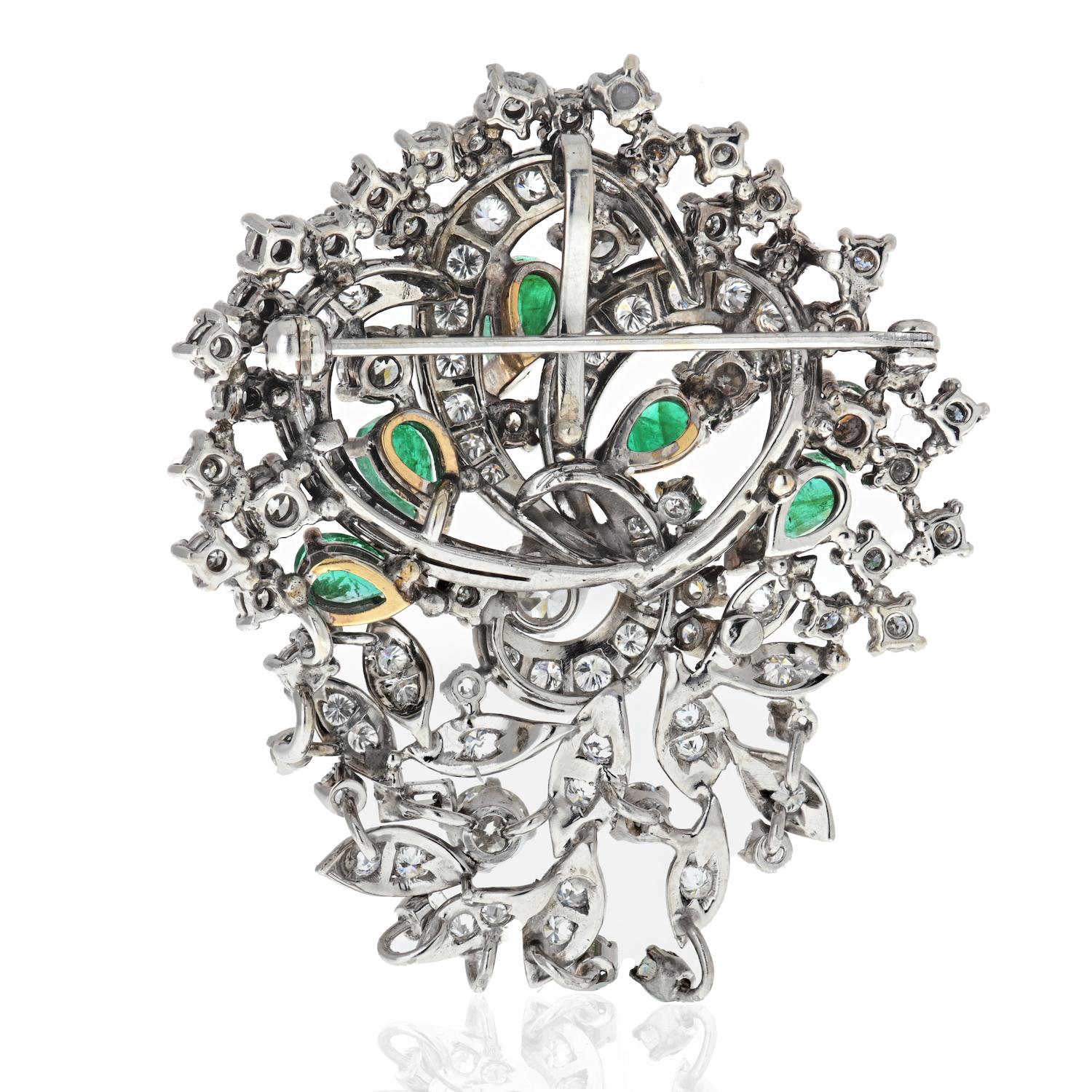 As you know, we love vintage brooches and we are always thrilled when we find one! Here is a platinum floral pin with green emeralds and diamonds. Diamonds are set upon the wires and are held by prongs. Five green emeralds of pear shapes are mounted