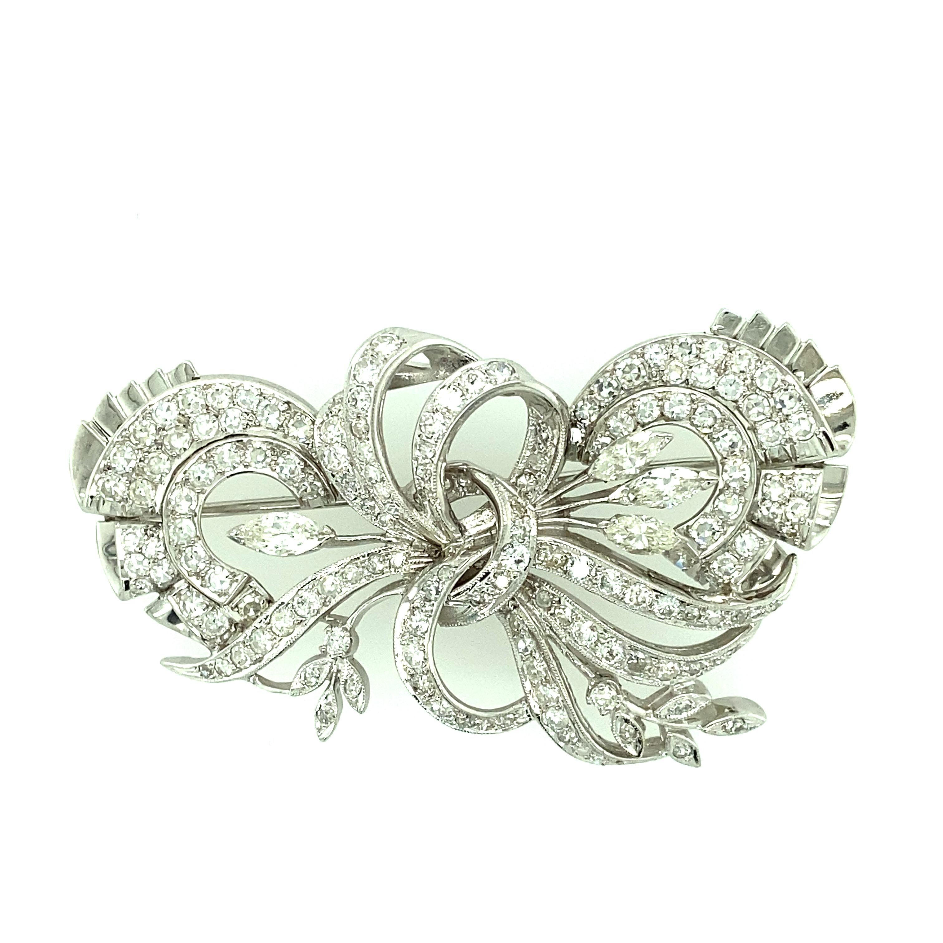 Marquise Cut 5.35 Carat Total Weight Diamond Brooch in Platinum. 1940s.