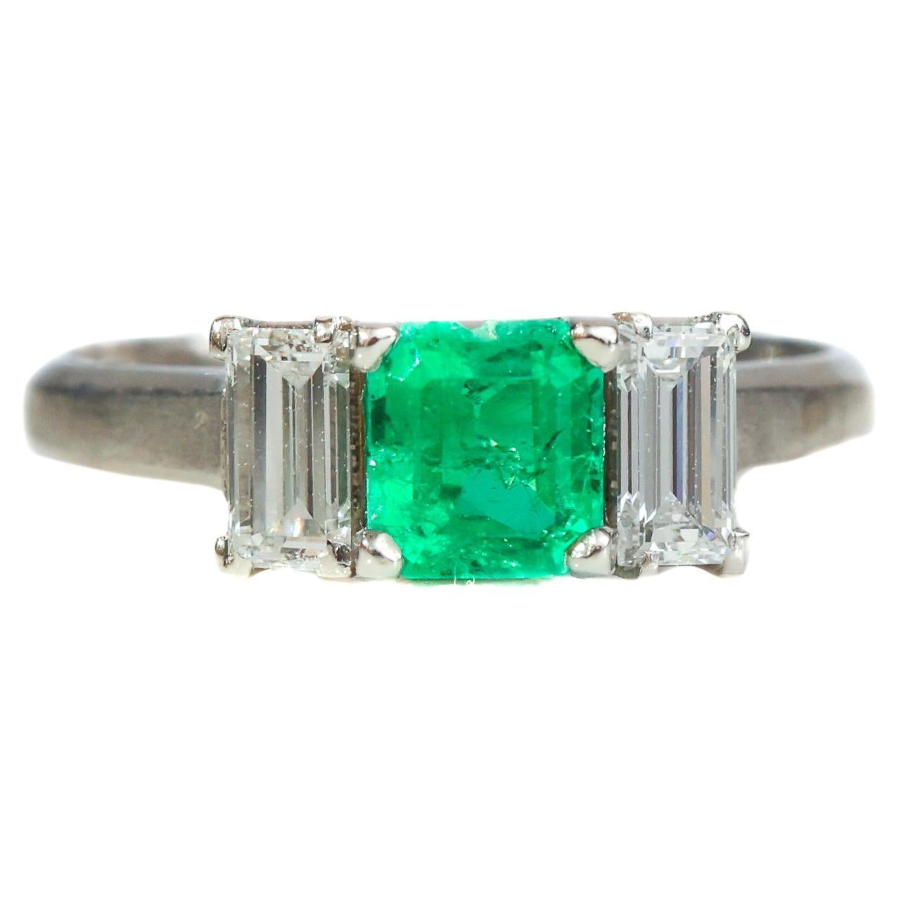 1940s Platinum Emerald and Diamond 3-Stone Ring For Sale