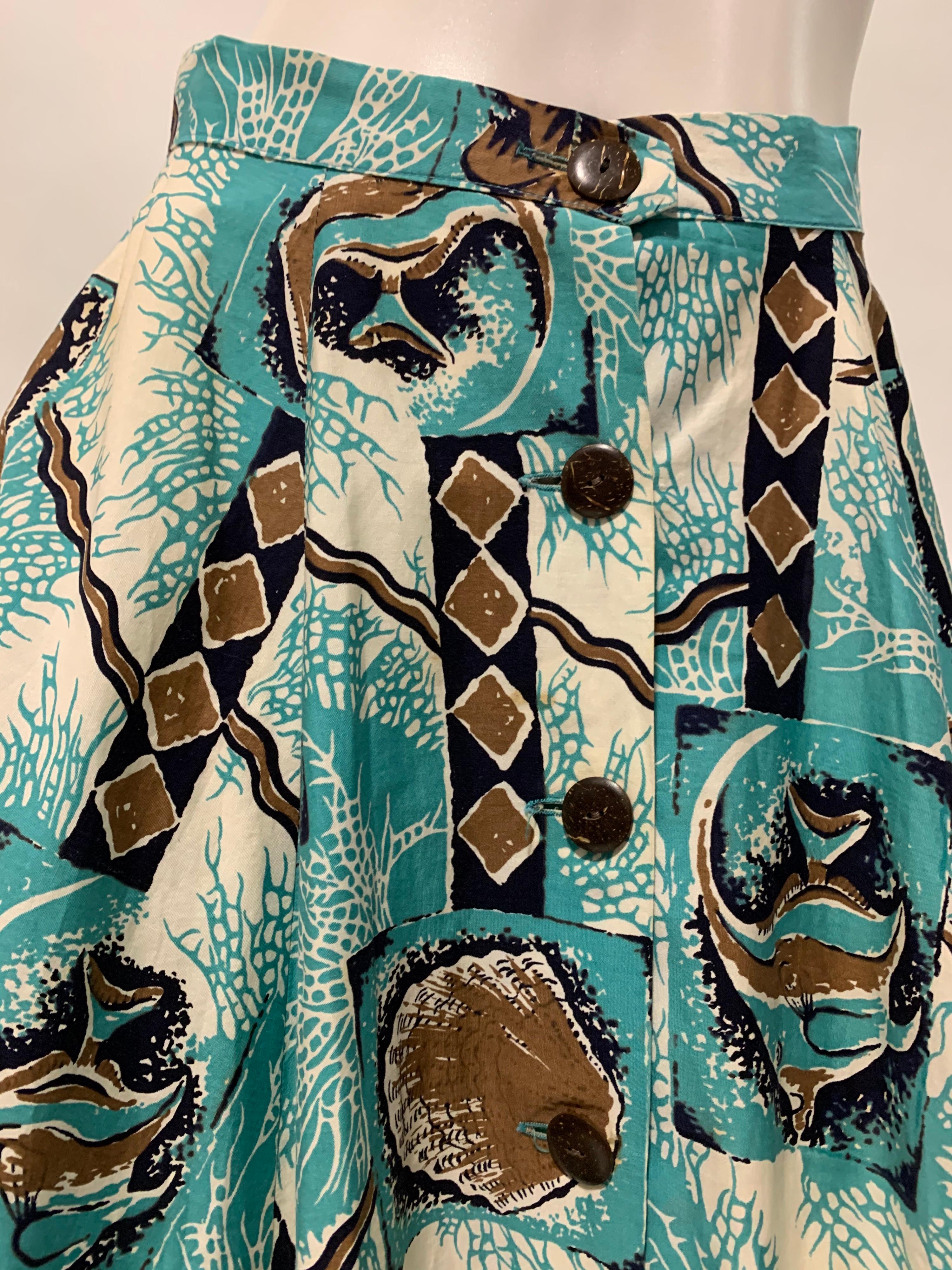1940s Rare Alfred Shaheen Cotton Tropical Print Coconut Button Front Skirt. Print is turquoise, black, brown and white in palette. Tiki style fun! Size 6.