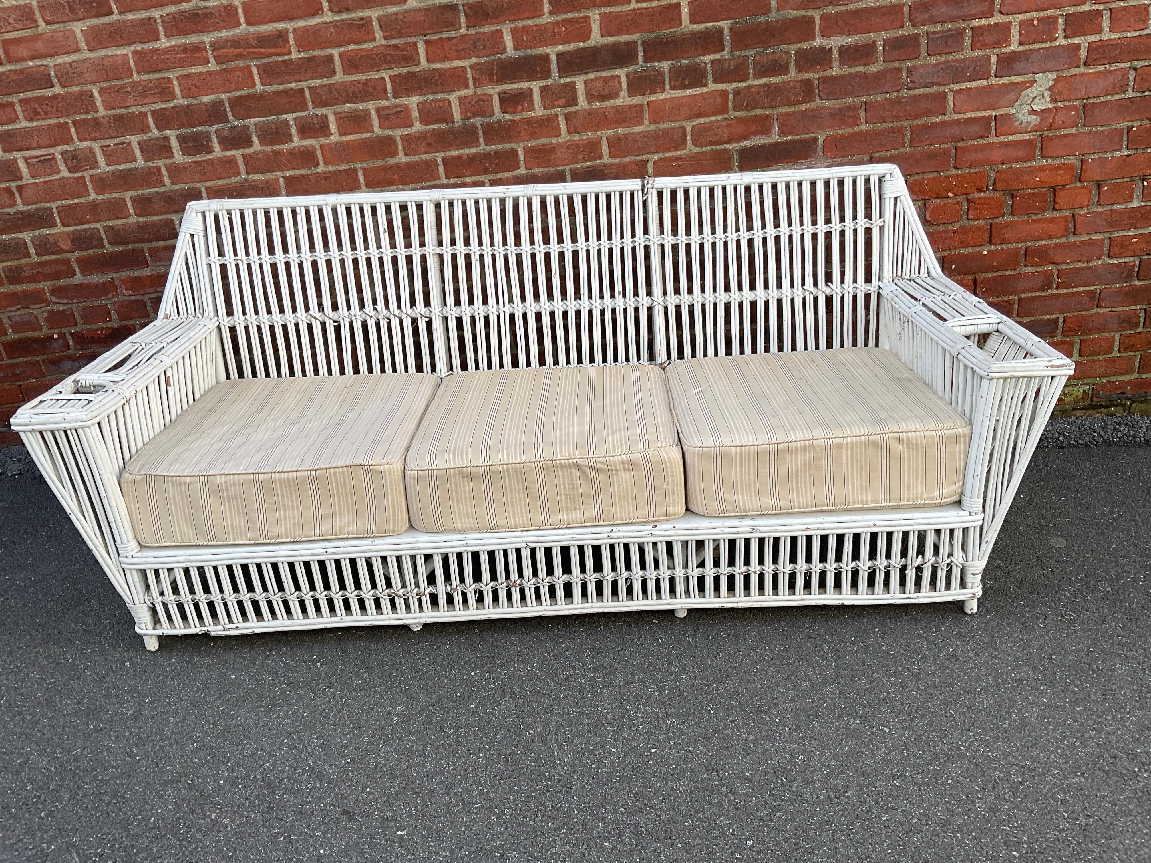 1940s Rattan couch and chaise lounge. Some strips missing as shown in pictures. Cushions need to be reupholstered .