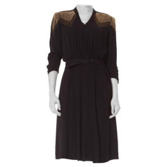 1940S  Black Rayon Belted Dress With Deco Beaded Shoulders