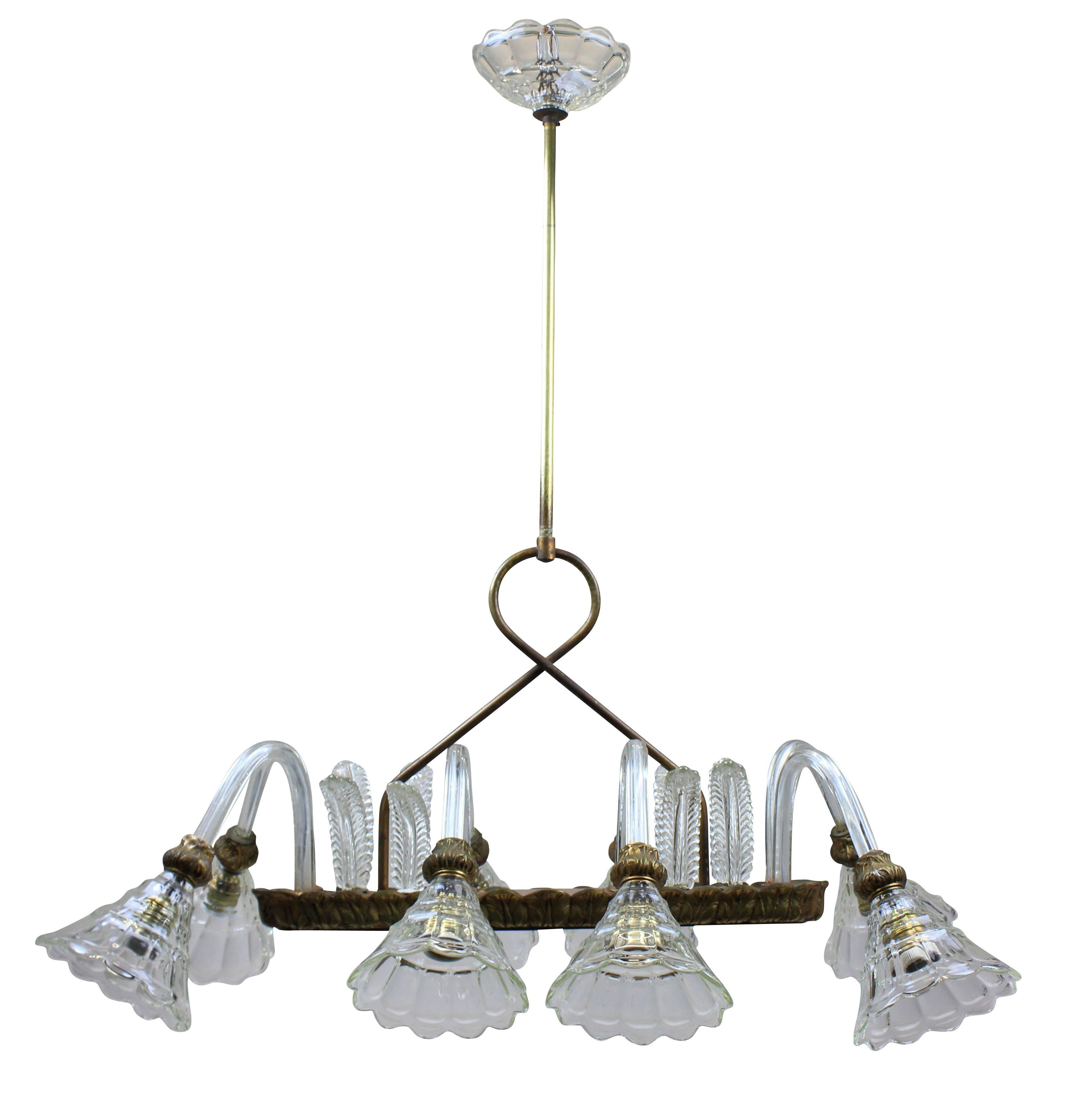 An eight-arm Barovier light of rectangular design. With hand blown leaves, arms and cups and brass fittings.