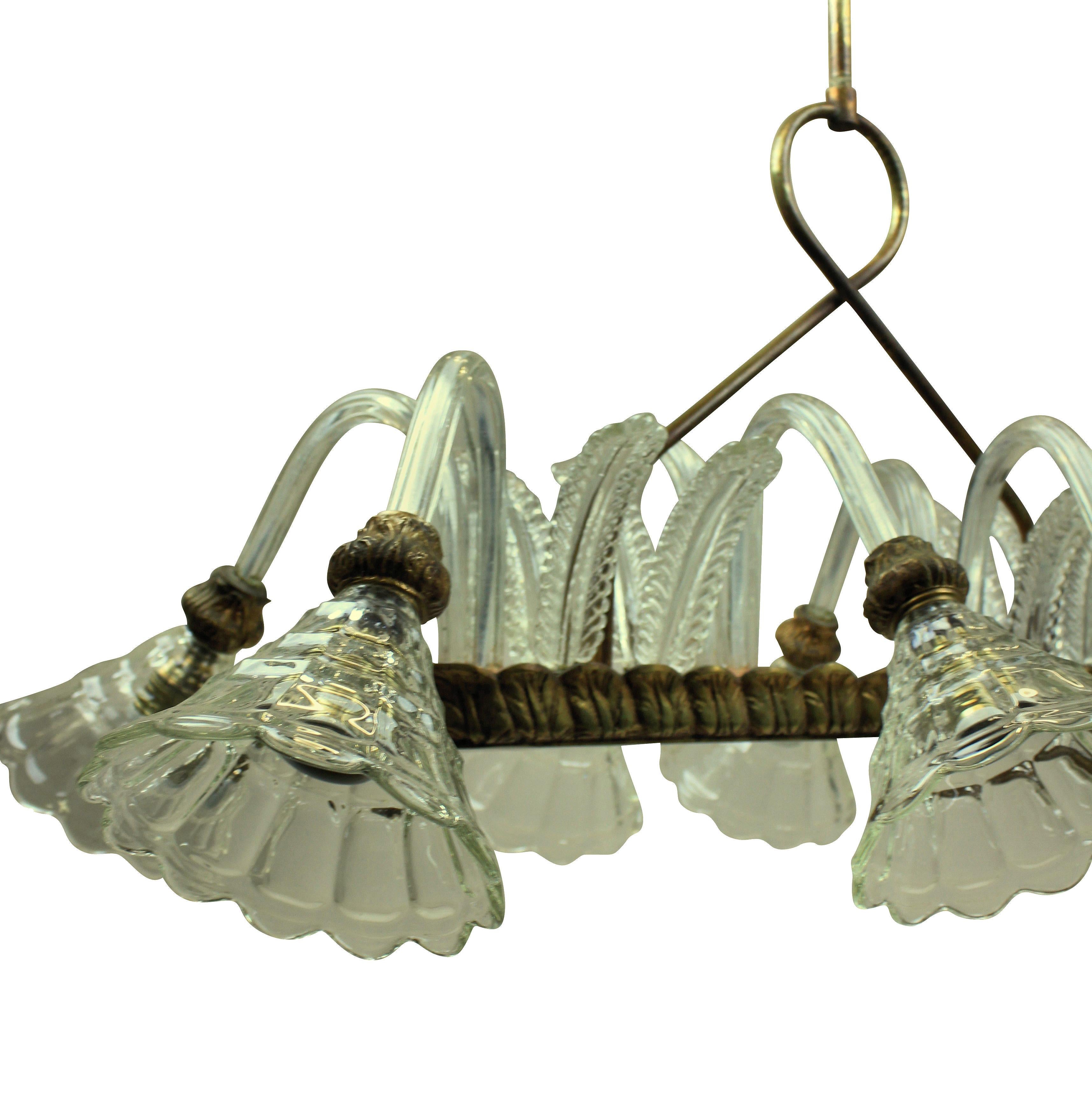 An eight-arm Barovier light of rectangular design. With hand blown leaves, arms and cups and brass fittings.