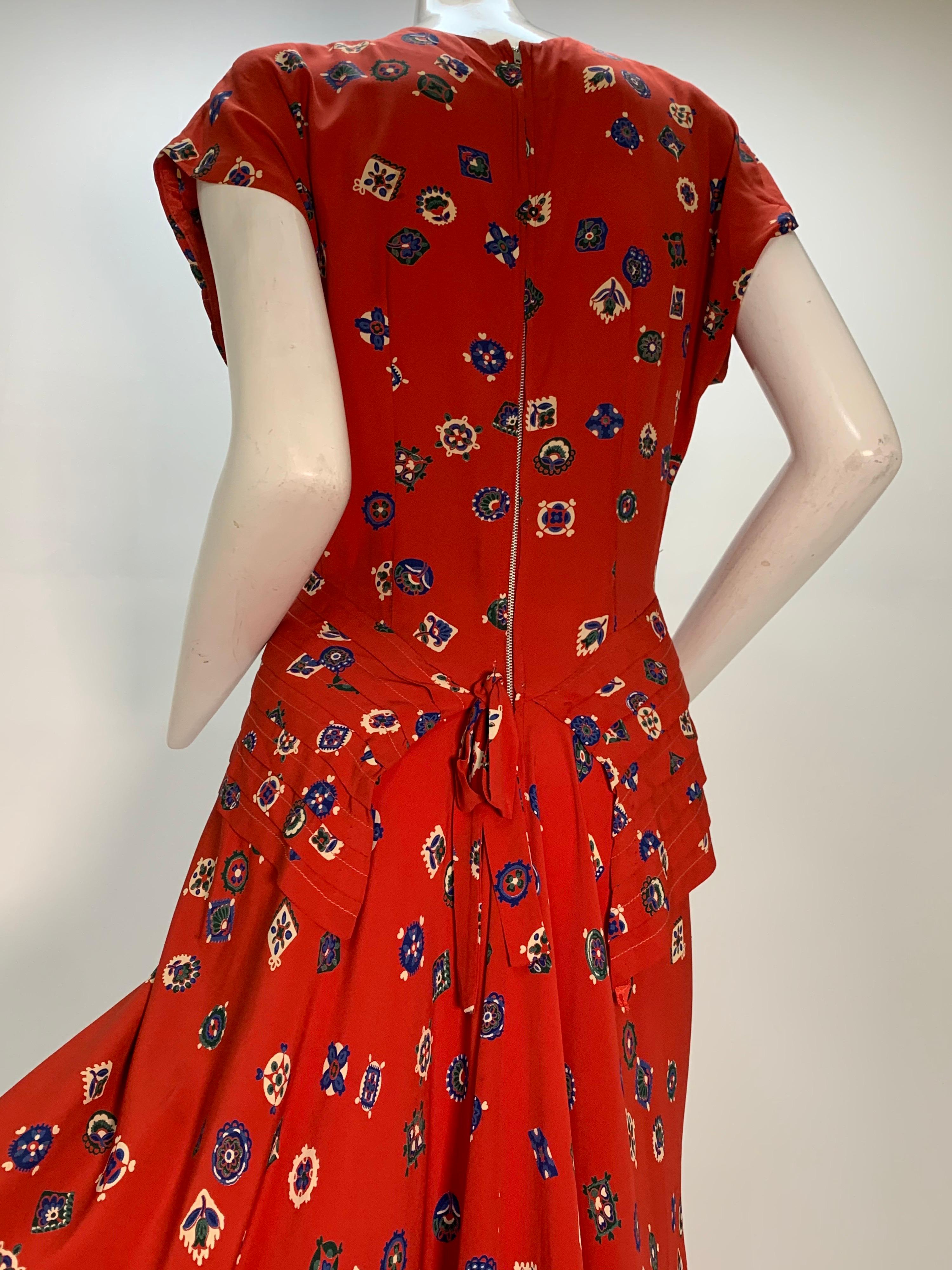 1940s Red Rayon Print Crepe Swing Dress With Pleated Peplum and Shoulders For Sale 4
