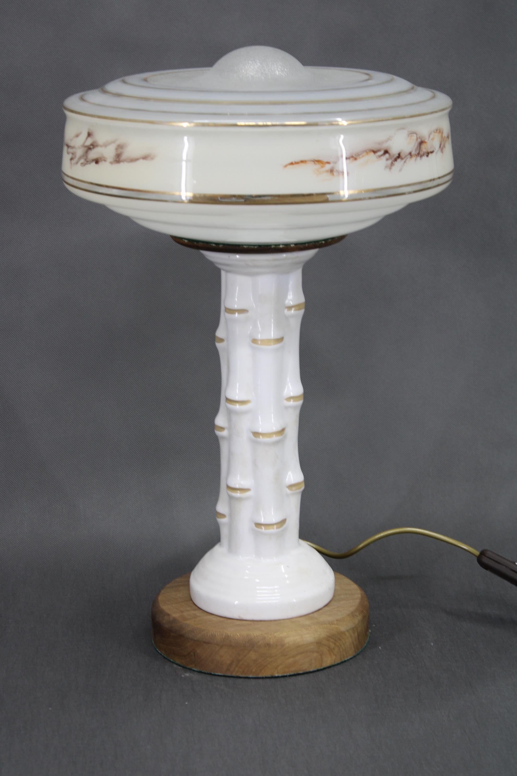 - Newly rewired  
- 2x E26-E27 bulb 
- US wiring compatible (US plug adapter includes) 
- New wooden holder for glass shade 
- The glass shade is laying on the wooden holder without any other attachment 
- Wooden base
