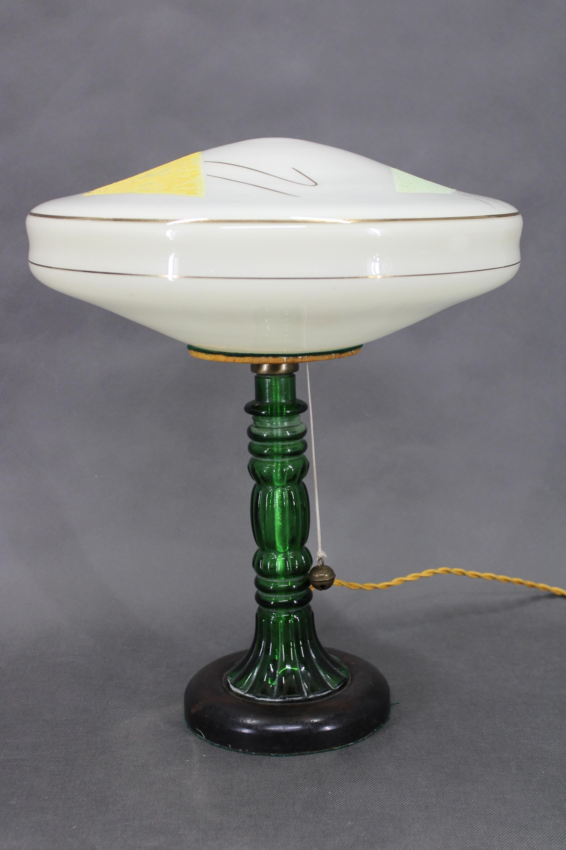 - Newly rewired  
- 2x E26-E27 bulb
 - US wiring compatible (US plug adapter includes) 
- New wooden holder for glass shade 
- The glass shade is laying on the wooden holder without any other attachment 