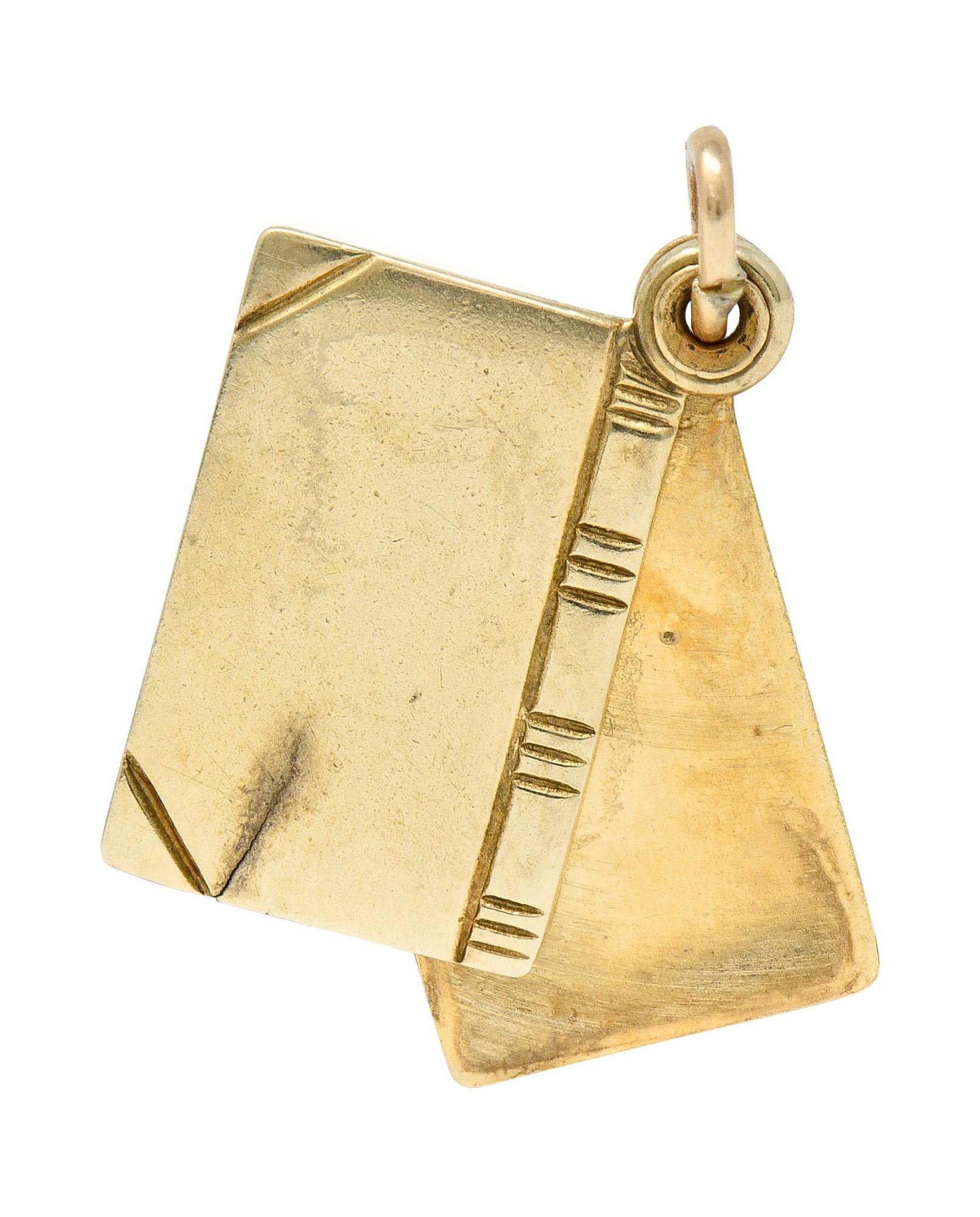 gold book pendant