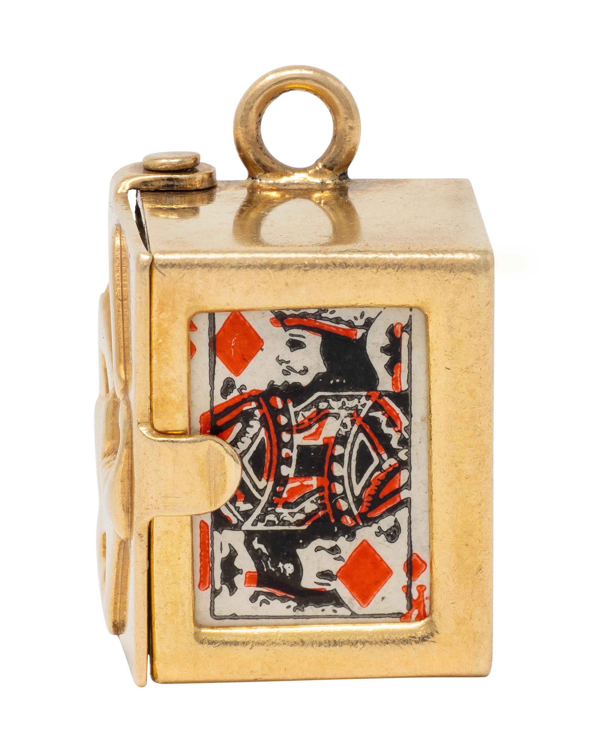 Designed as a dimensional box of playing cards
Accented by a highly rendered hand holding cards
Hinged door opens to reveal miniature removable paper playing cards
Completed by jump ring bale
Stamped for 14 karat gold with makers mark
Circa: