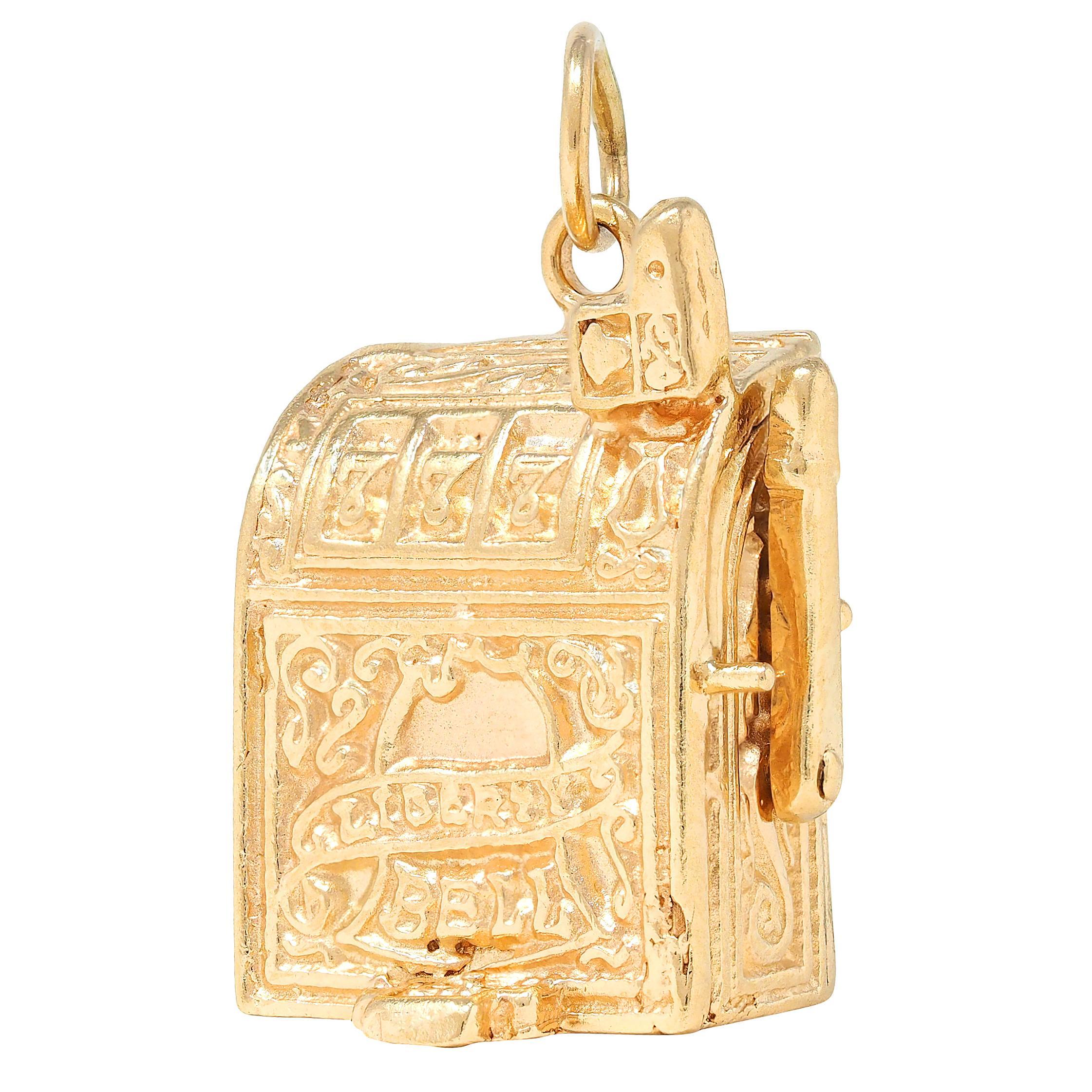 Charm is designed as a highly rendered antique slot machine
Front is grooved with a row of lucky sevens and scroll motifs
Depicting a bell with banner inscribed 