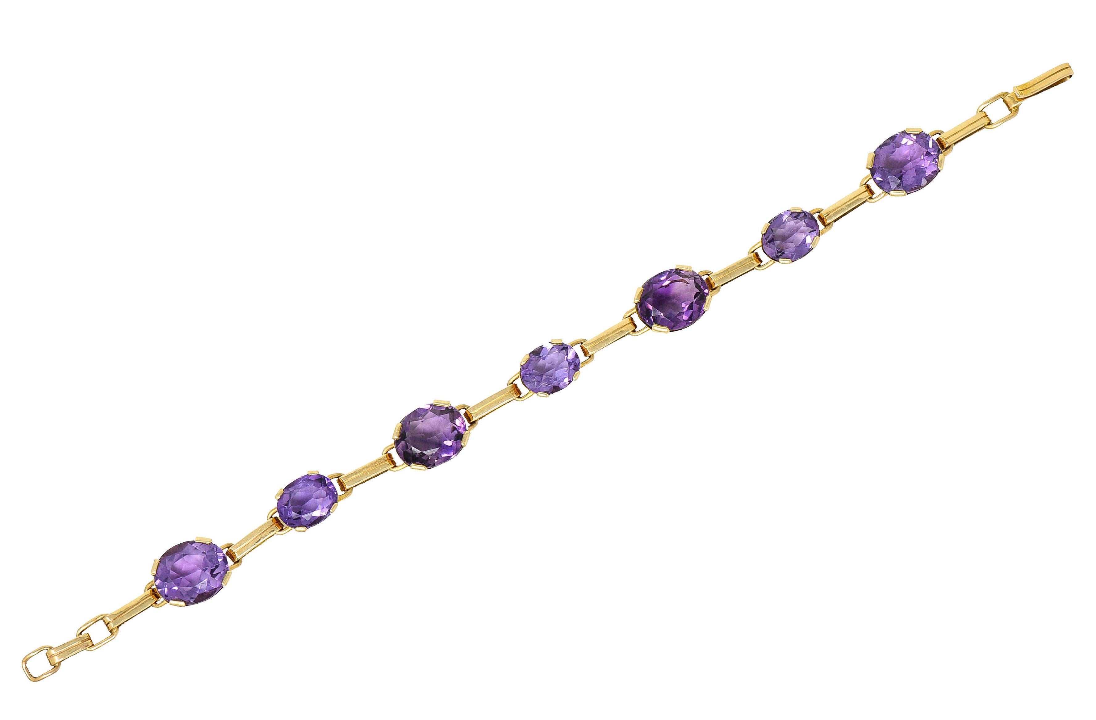 Designed as a link bracelet with oval amethyst cabochon stations

Amethyst measure 12.0 x 10.0 mm and 10.0 x 8.0 mm

Violetish purple hue with good saturation and very well matched

Each amethyst is basket set and alternates with bar spacer