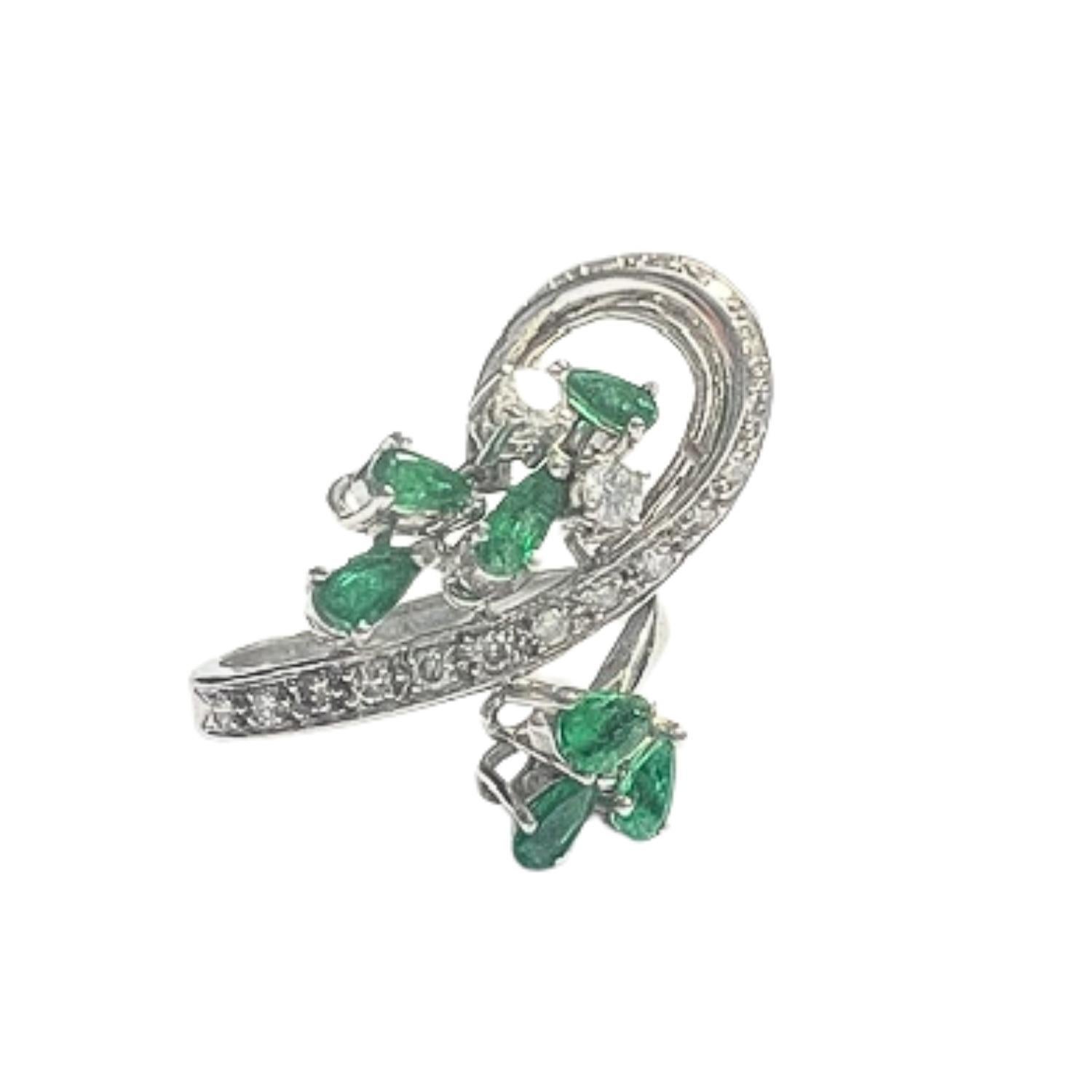 A beautiful retro-style ring from the 1940-45 era, featuring an exquisite emerald and diamond design, crafted in 18K gold.

**In STOCK**

Diamonds: 0.30 ct total, brilliant-cut, VS clarity, HG color.
Emerald: 1.5 ct pear-cut emerald.
Weight: 4.51