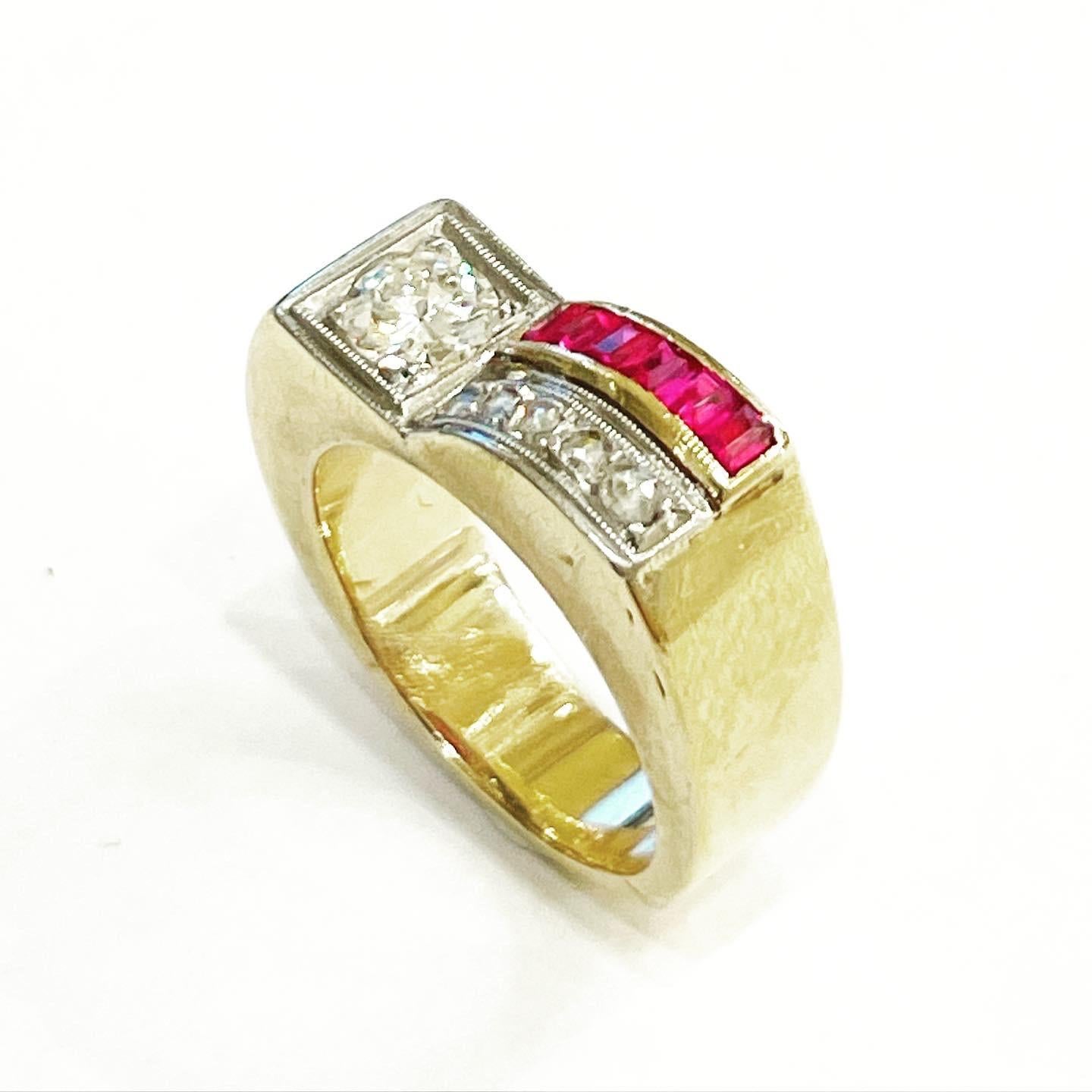Superb tank ring, linear and geometrical design typical for this period.
Ring in 18 karat yellow  gold, diamonds and rubies.
Circa 1935-1940.
Old European diamond cut and calibrated cut rubies.
Total approximate weight of the diamonds:  main diamond