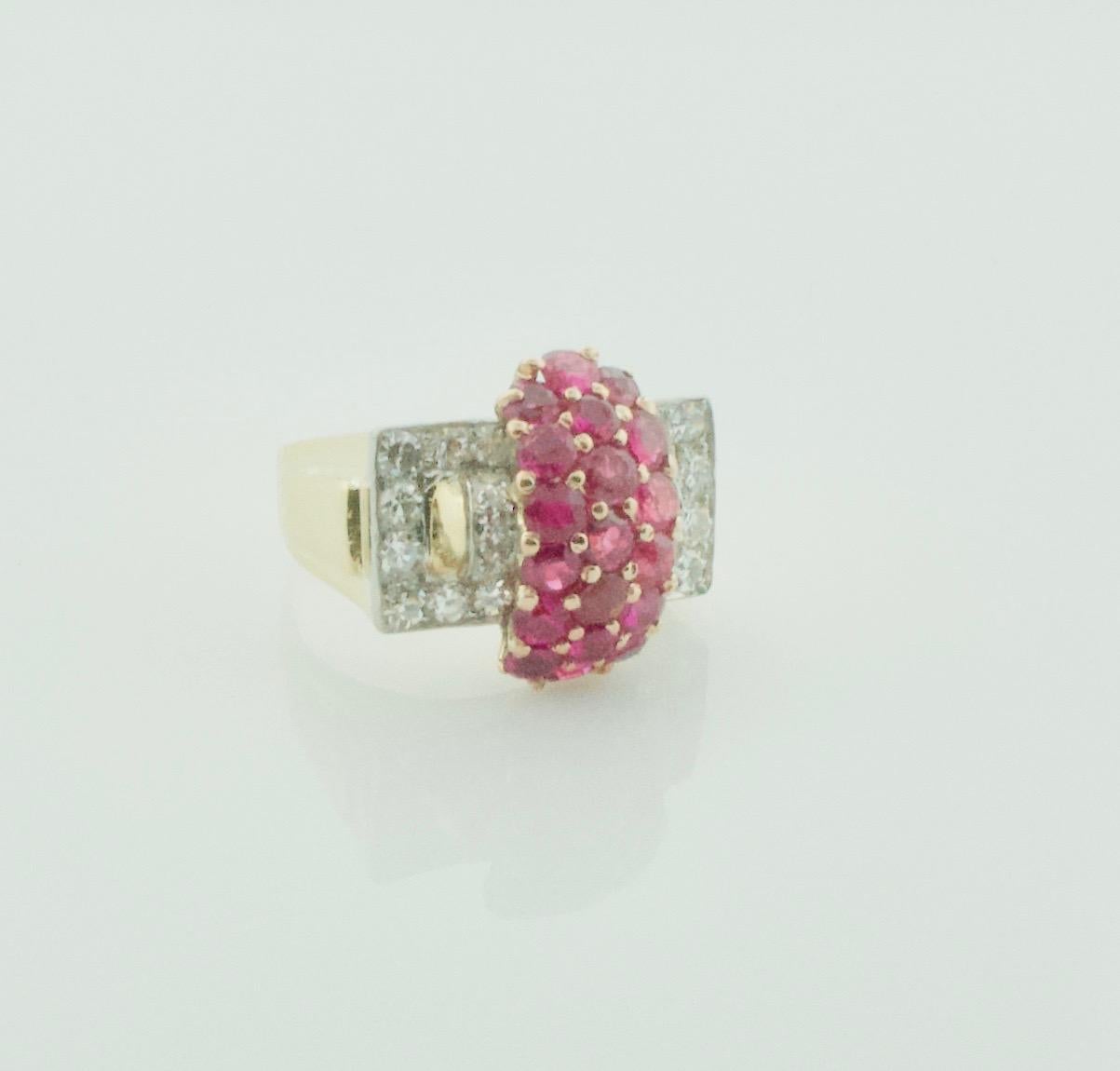 1940's Retro Ruby and Diamond Ring in Yellow Gold and Palladium
Nineteen Round Rubies weighing 2.30 carats approximately [bright with no imperfections visible to the naked eye]
Twenty Four Round Cut Diamonds weighing .80 carats approximately  GHI - 