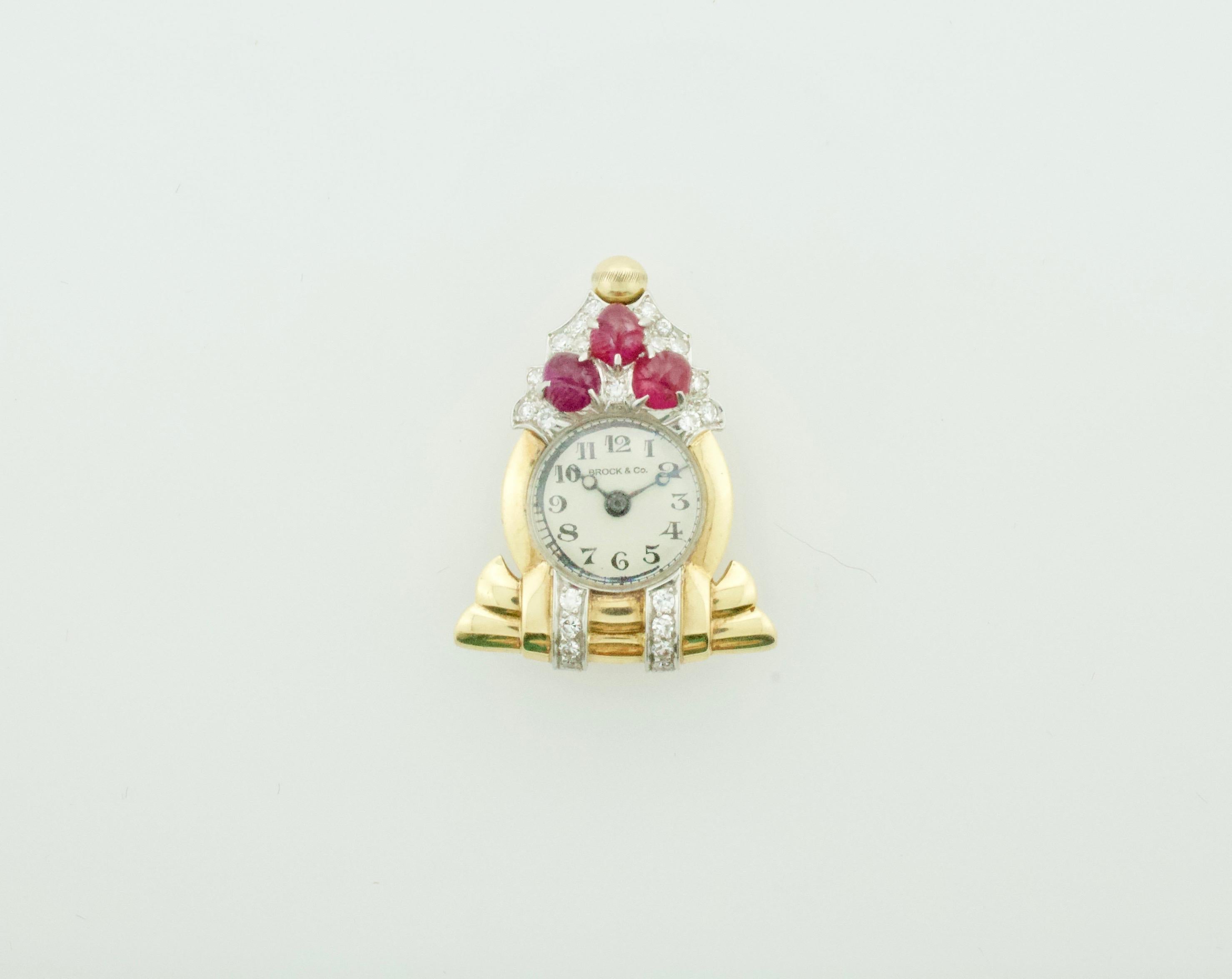 1940's Retro Ruby and Diamond Watch, Bracelet and Brooch Clip
A Truly Remarkable Piece of Jewelry
The Watch Detaches As A Stand Alone Brooch Clip
Three Carve Rubies Weighing .75 Carats Approximately 
Ten Round Brilliant Cut Diamonds Weighing .30