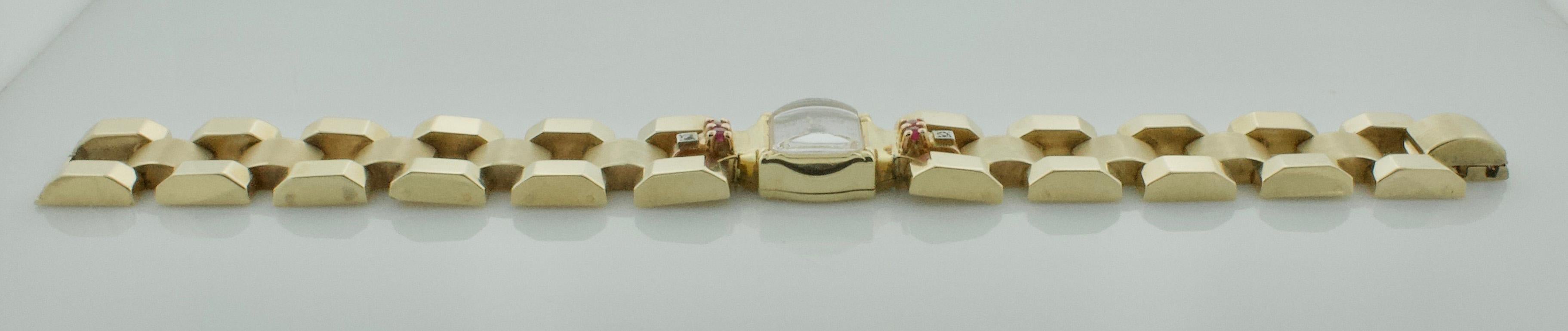 Montre rétro à rubis et diamants 