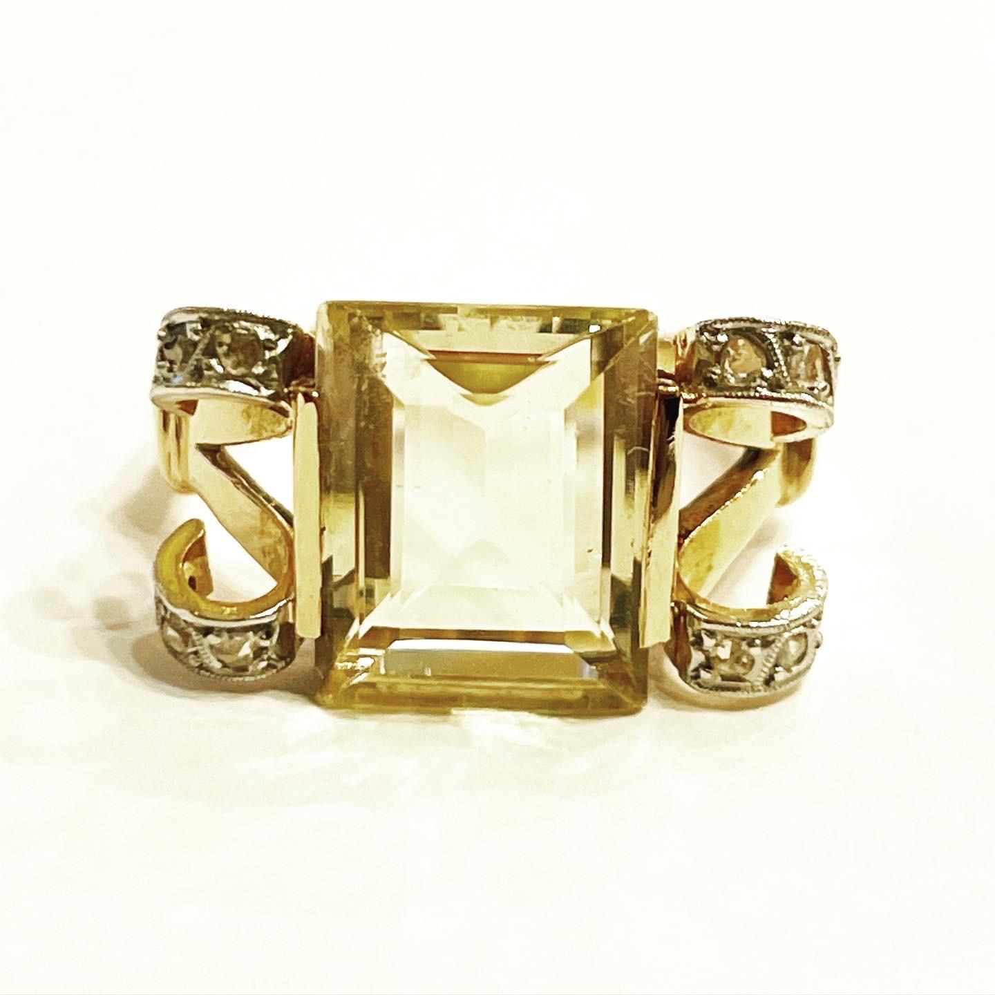 Beautifully designed and handcrafted in 18 karat yellow gold and platinum, this Retro cocktail ring from circa 1940 features a lovely Citrine measured to weigh approximately 3.60 carats and old European cut diamonds.
Superb tank ring, linear and