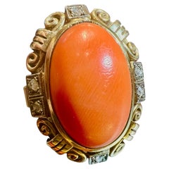 1940s Ring In 14 Carat Gold Set With Coral Cabochon And Old Cut Diamonds