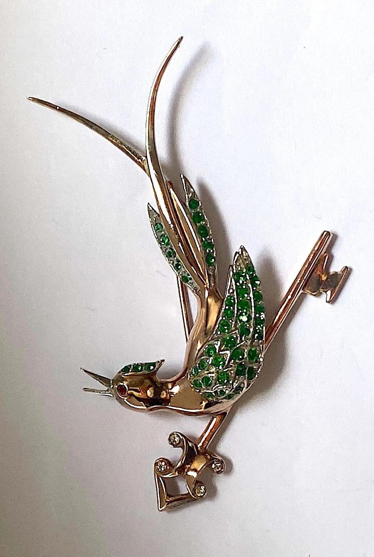 A charming and whimsical 1940s brooch of an animated bird singing 