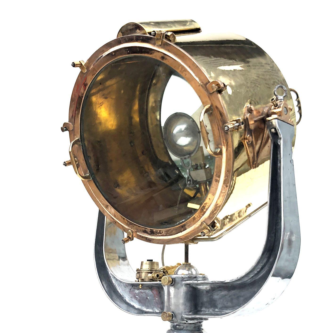 An extremely sought after naval searchlight dated circa 1940 and made by Rotherham's of Coventry, England. Professionally restored by Loomight in the UK ready for modern use.
 
Voltage - 110v or 220v compatible, we will send the correct bulb for
