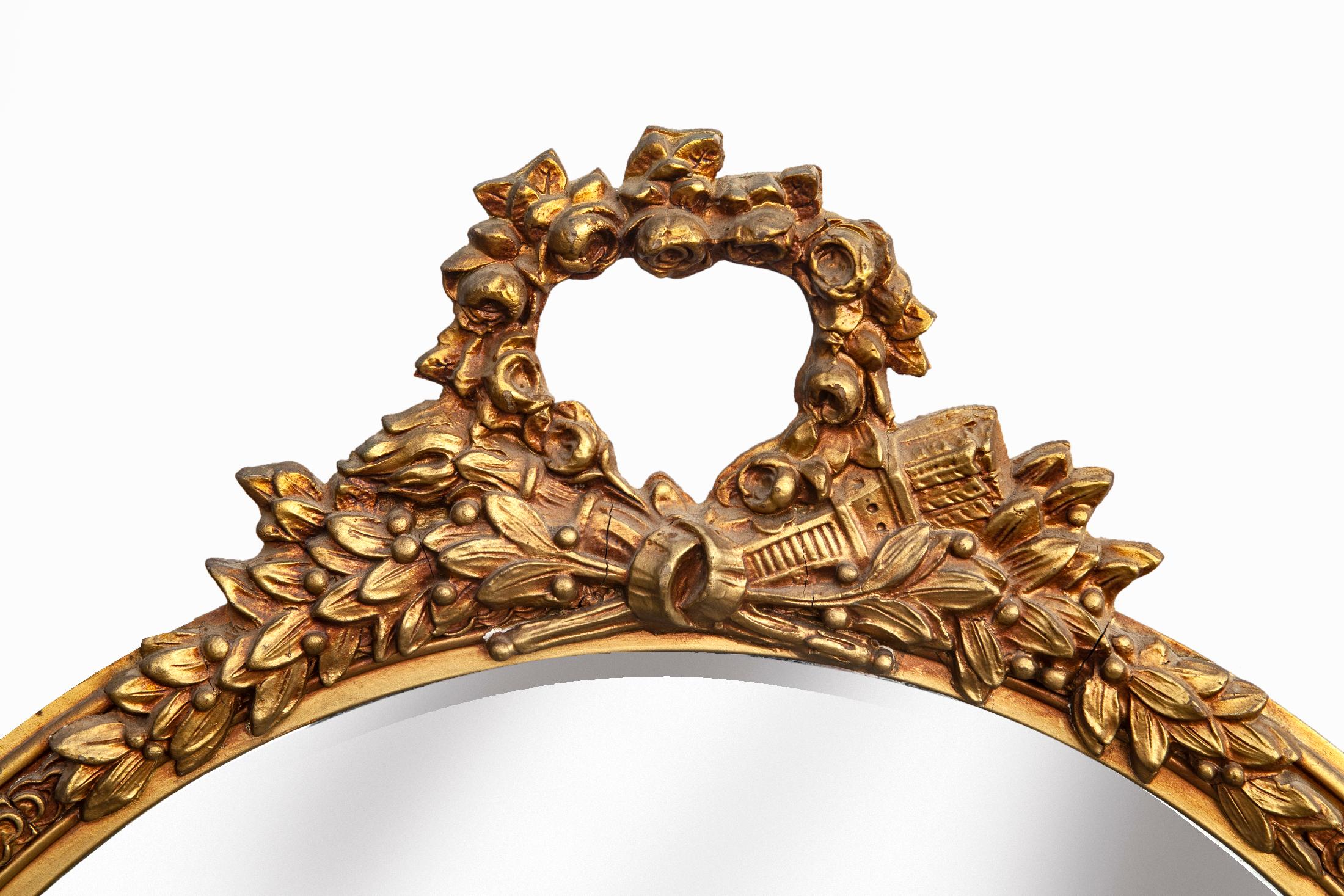 1940s Round Gold Mirror Wreath Crown.
Carved frame topped with a wreath, original gold finish, as found.
Very sturdy & well crafted. New backing & wire.
