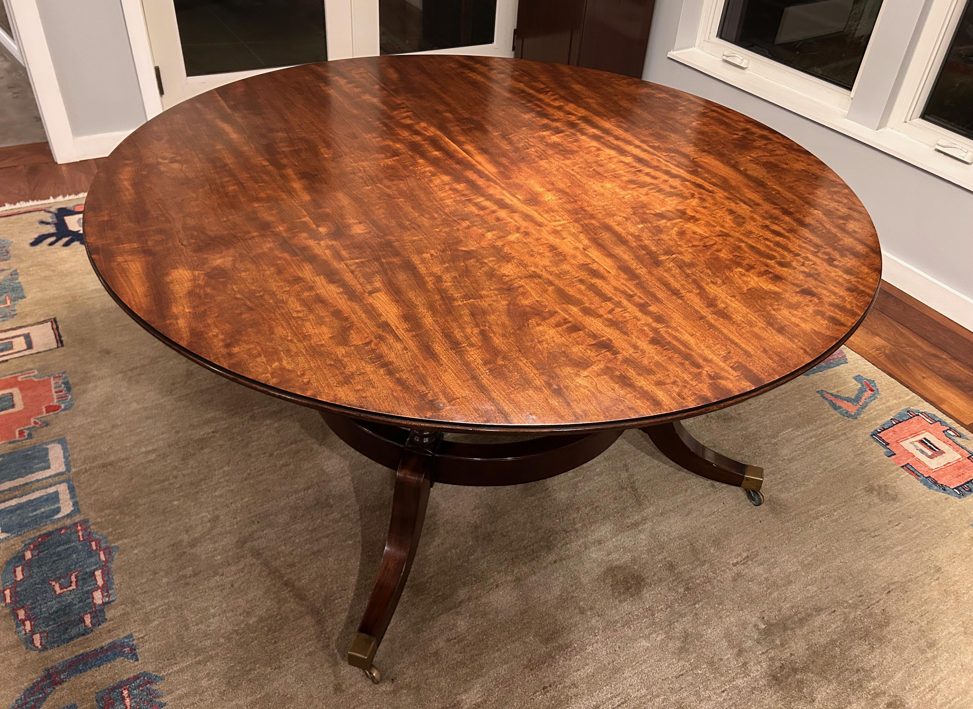 British 1940's Round Mahogany Veneer Dining Table with Crescent Leaves and Leaf Cabinet For Sale