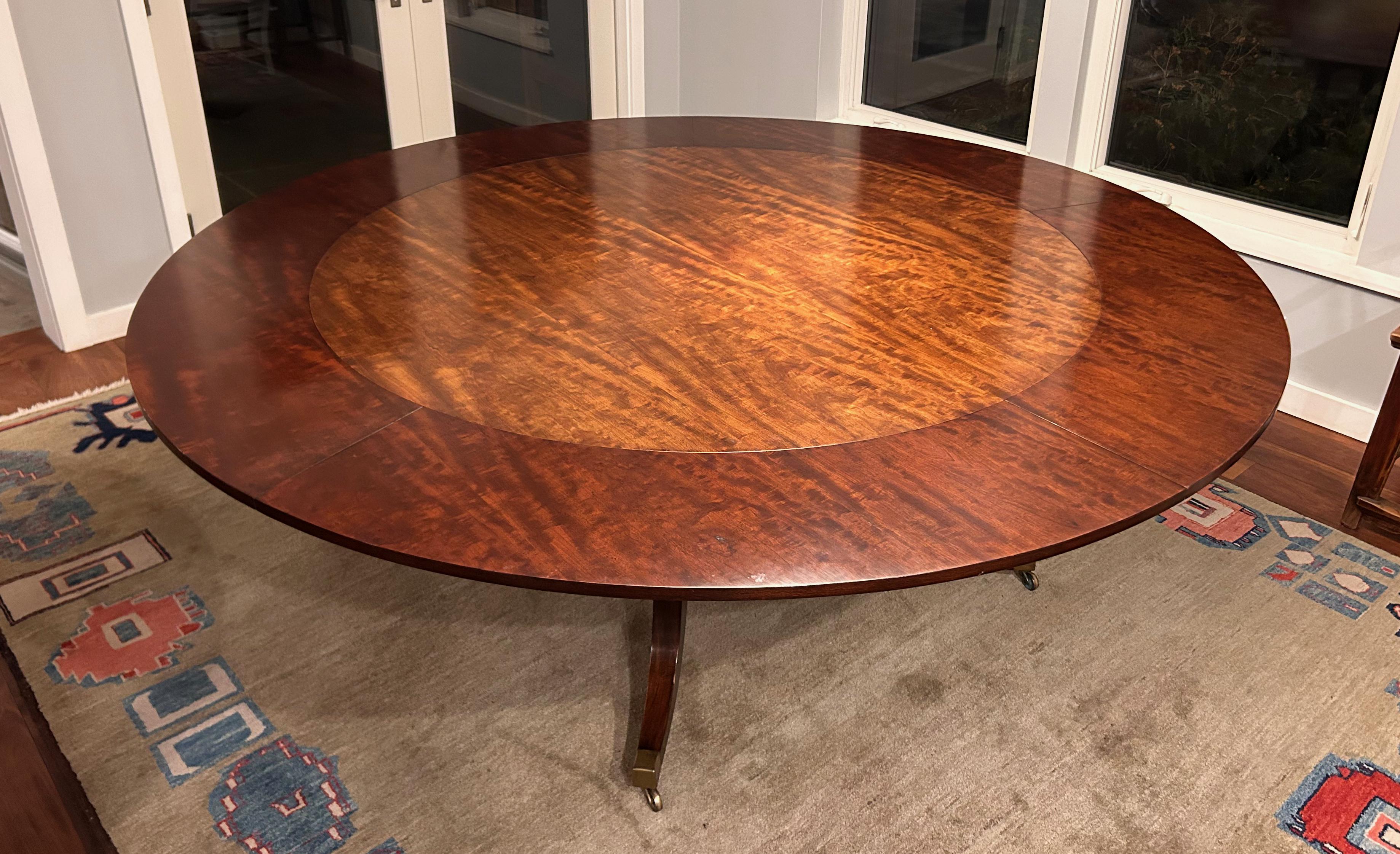 Wood 1940's Round Mahogany Veneer Dining Table with Crescent Leaves and Leaf Cabinet For Sale