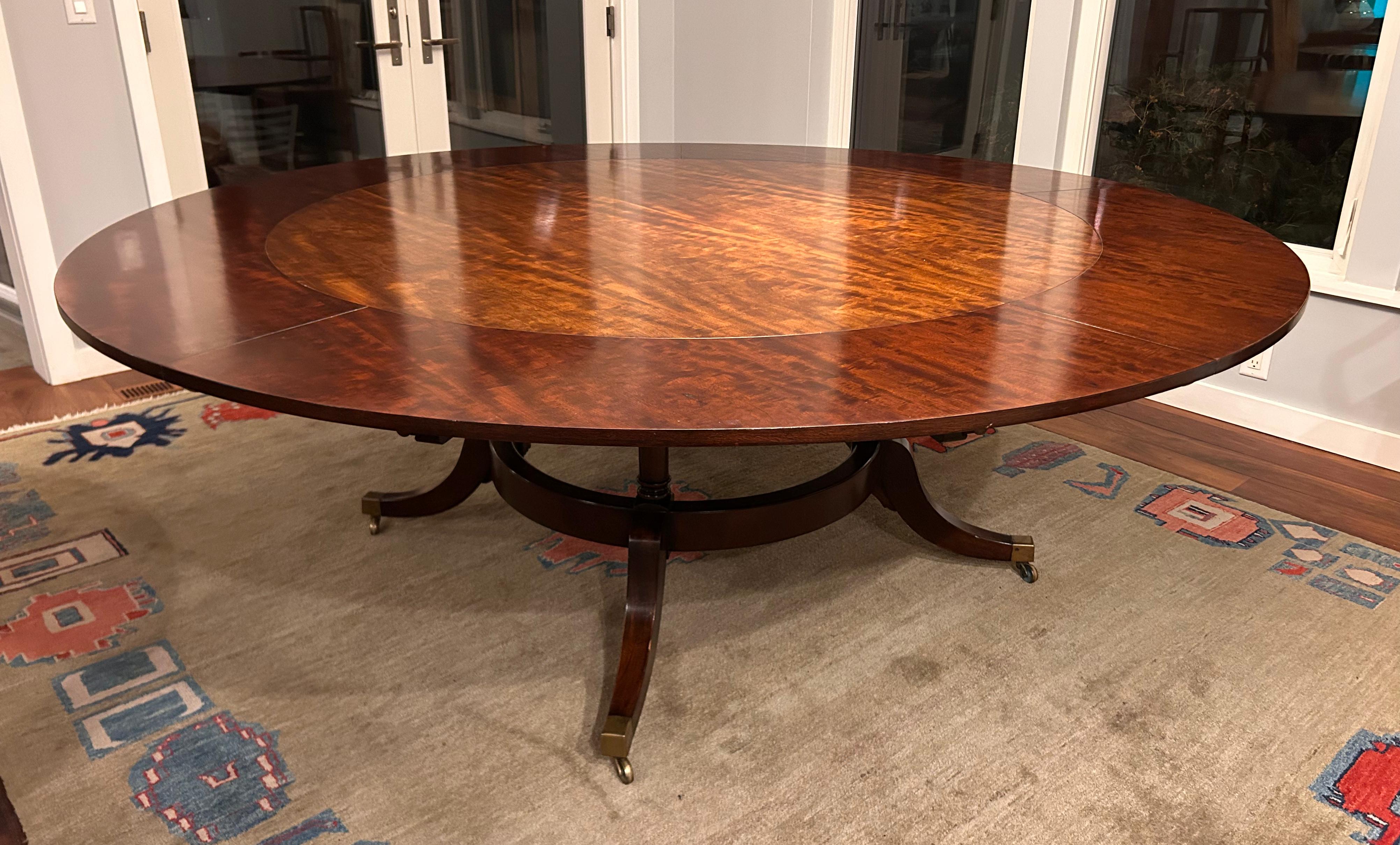 1940's Round Mahogany Veneer Dining Table with Crescent Leaves and Leaf Cabinet For Sale 1
