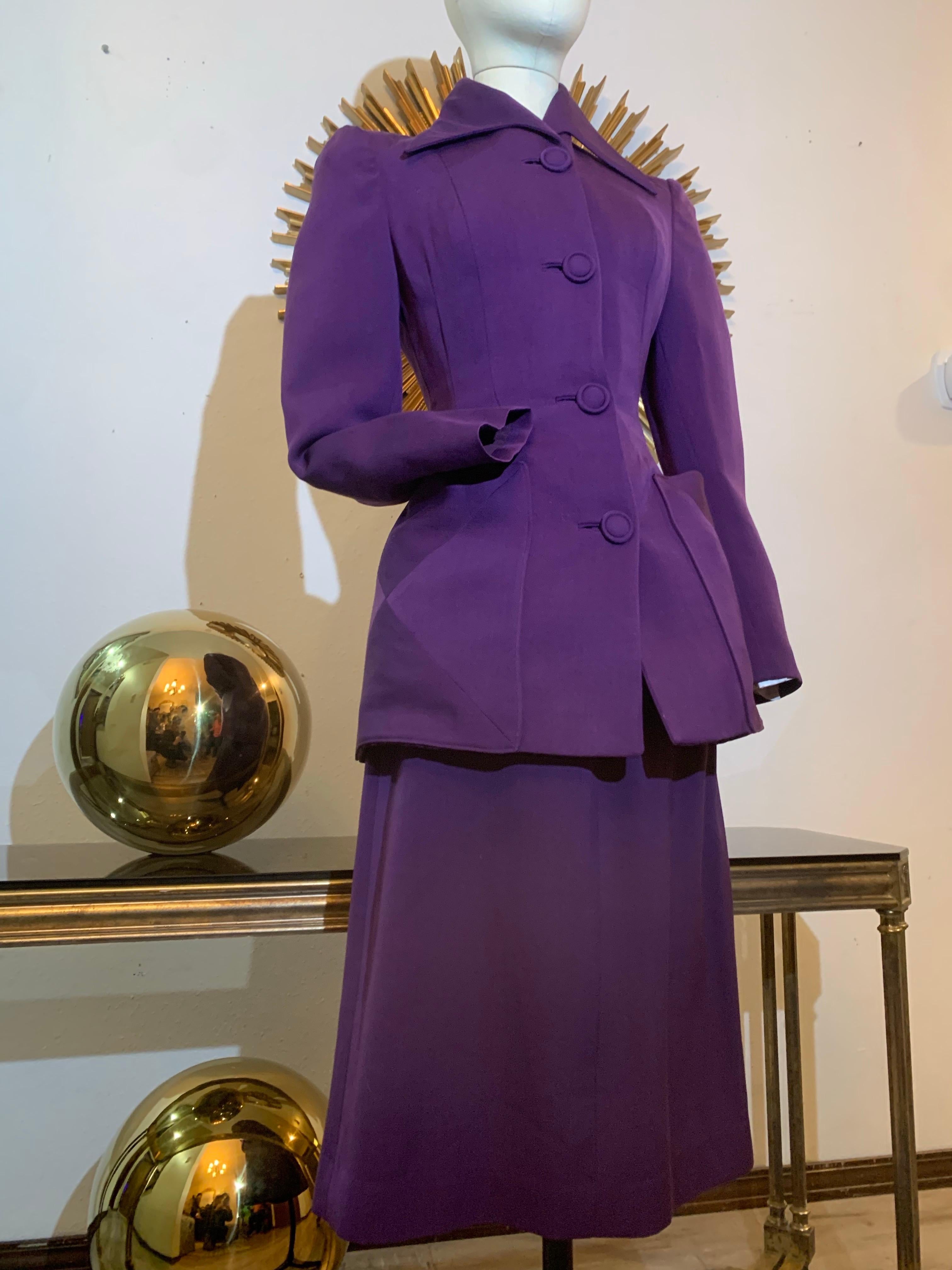 1940s Royal Purple Wool Gabardine Skirt Suit w Nipped Waist & Huge Pockets:  This is a spectacular example of iconic 1940s tailoring in pristine condition.  A sculpted, darted, nipped-in waistline on a longer jacket silhouette as well as huge