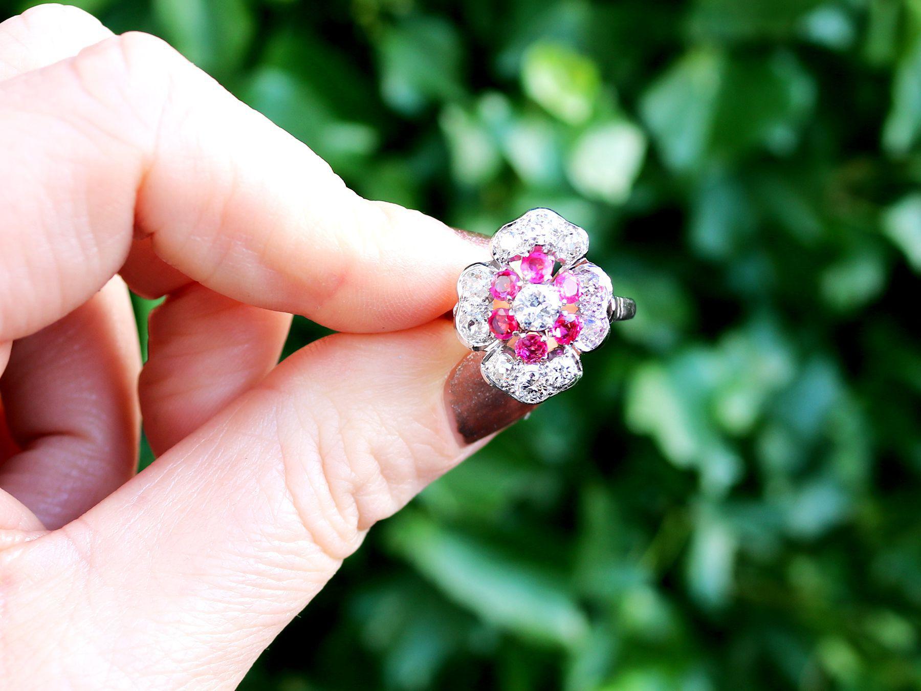 An impressive vintage 0.72 carat ruby, 1.63 carat diamond and platinum dress ring; part of our diverse ruby jewelry and estate jewelry collections.

This fine and impressive vintage ruby ring has been crafted in platinum.

The pierced decorated,