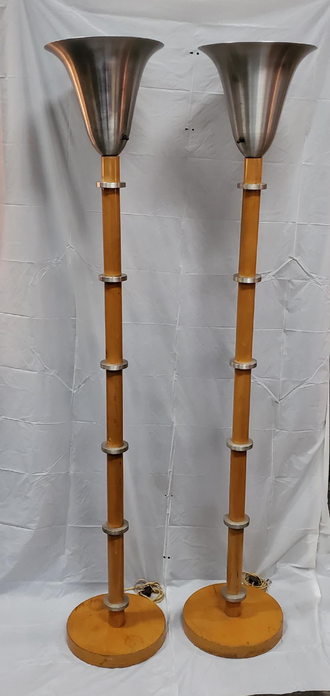 Rare 1940s Russel wright hardrock maple and spun aluminum torchiere floor lamps Art Deco Mid-Century Modern.

Beautiful rare pair of Russel wright torchiere floor lamps in excellent vintage condition., accented with 6 thick spun aluminum disks and