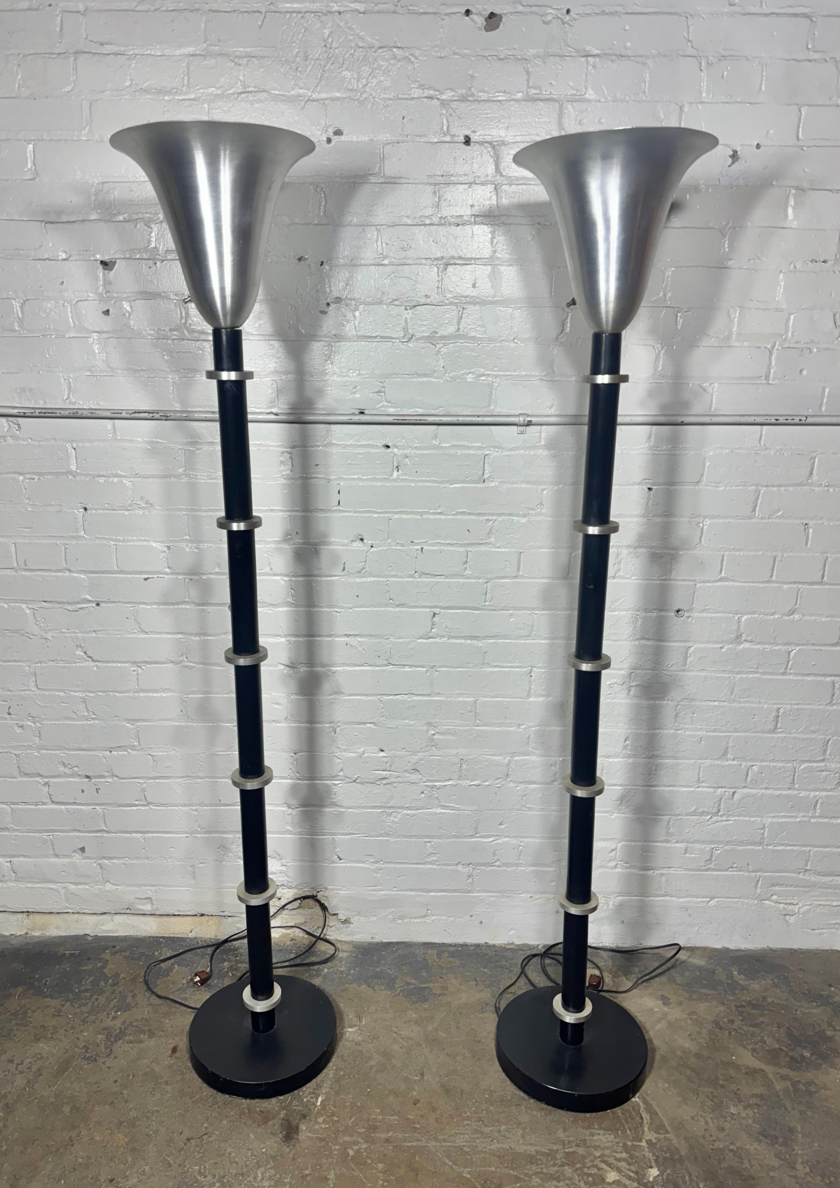 Extremely Rare 1940s Russel wright wood and spun aluminum torchiere floor lamps Art Deco /machine age/  Modernist

Beautiful rare pair of Russel wright torchiere floor lamps in nice vintage condition., accented with 6 thick spun aluminum disks and