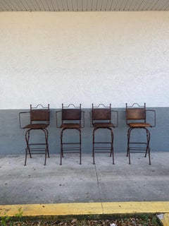 1940s Rustic Industrial Iron and Buffalo Leather Swivel Stools, Set of 4