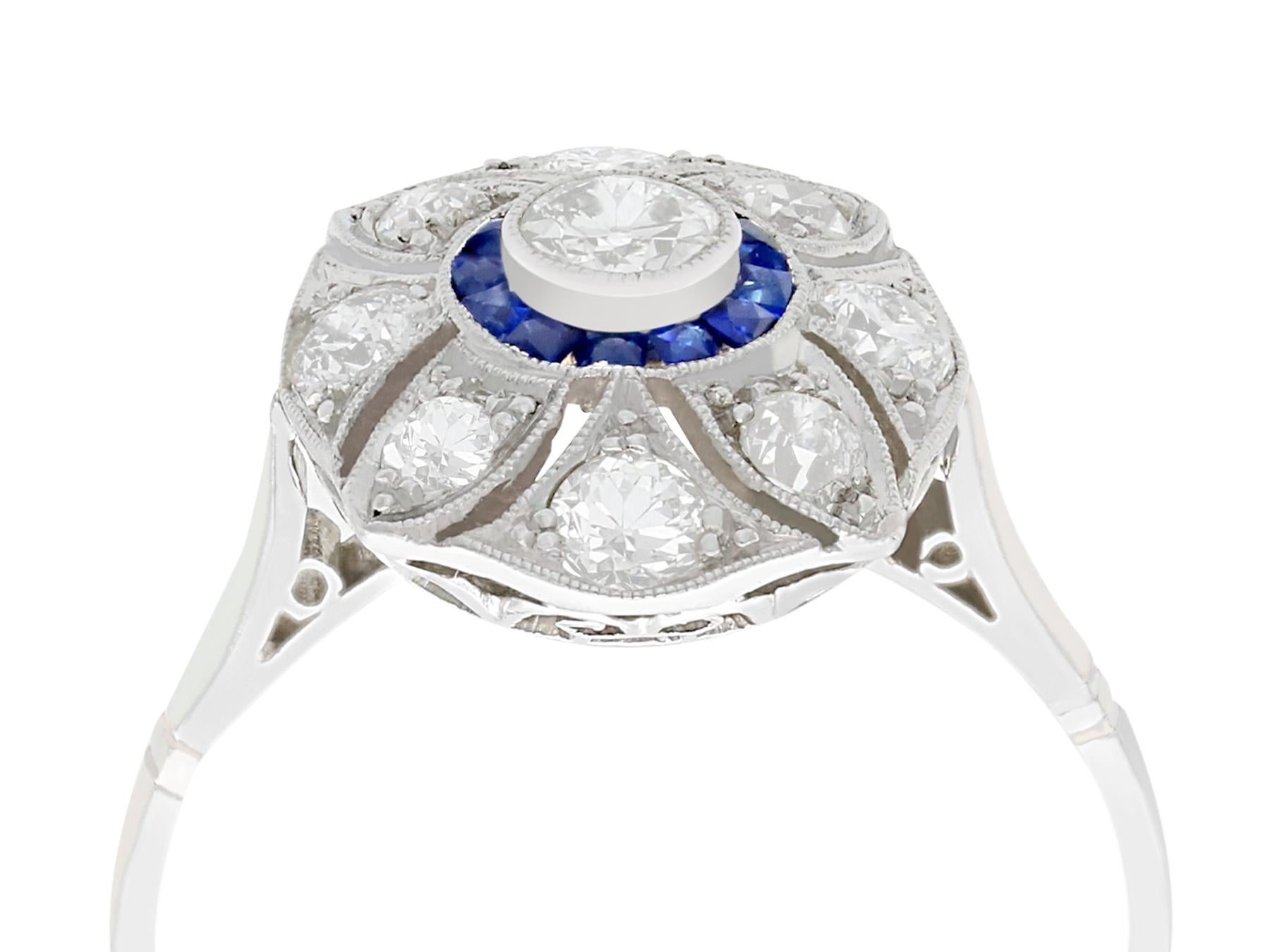 A stunning vintage 0.76 carat diamond and 0.18 carat blue sapphire, platinum cocktail ring; part of our diverse gemstone jewelry and estate jewelry collections.

This stunning, fine and impressive sapphire and diamond dress ring has been crafted in