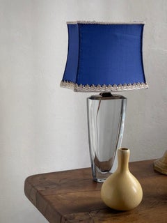 1940s Scandinavian Glass lamp with brass top and a blue vintage raw silk shade.