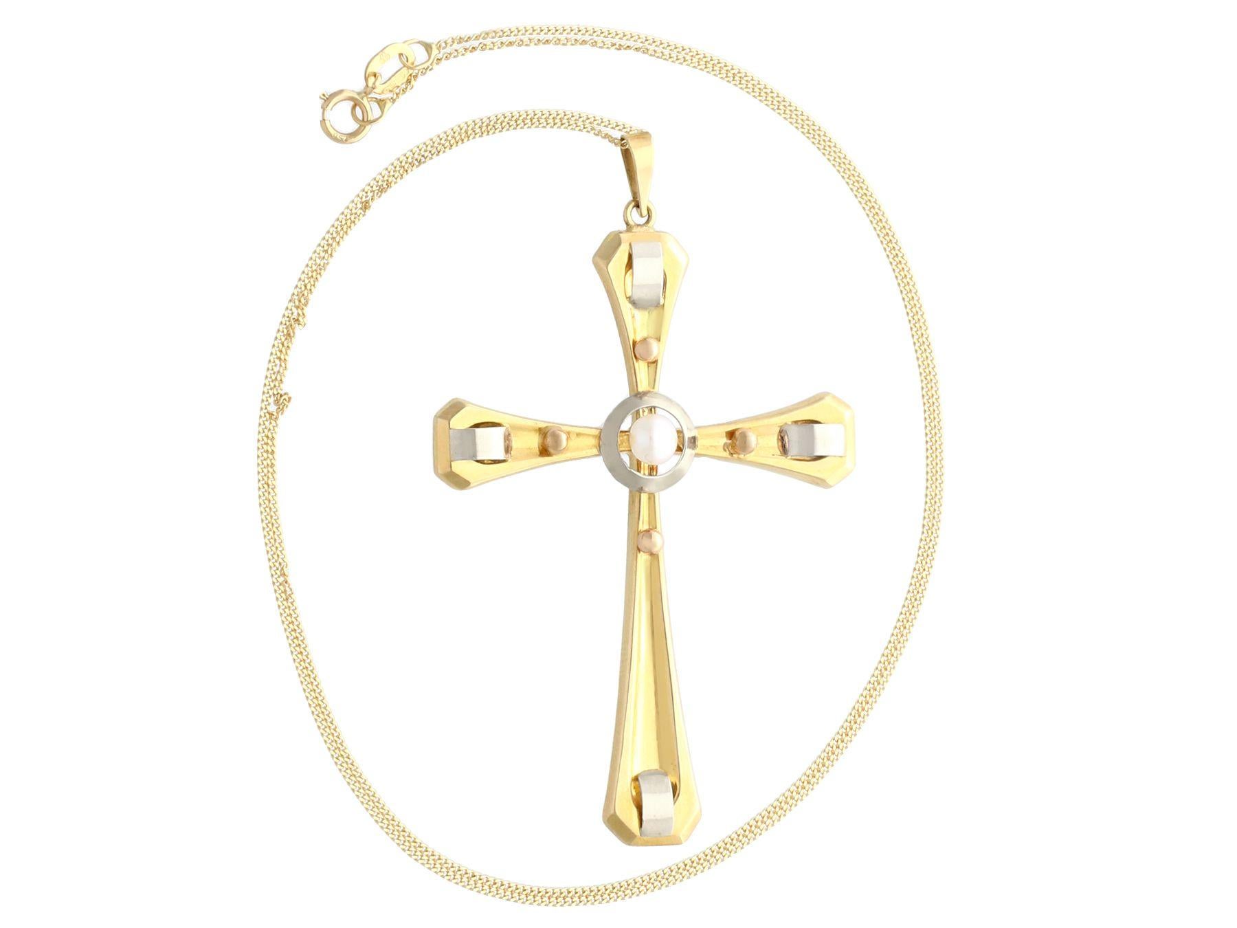 A fine and impressive seed pearl and 18 karat yellow gold cross pendant with 18 karat white gold and 18 karat rose gold applied decoration; part of our diverse vintage jewellery and estate jewelry collections

This fine and impressive vintage cross