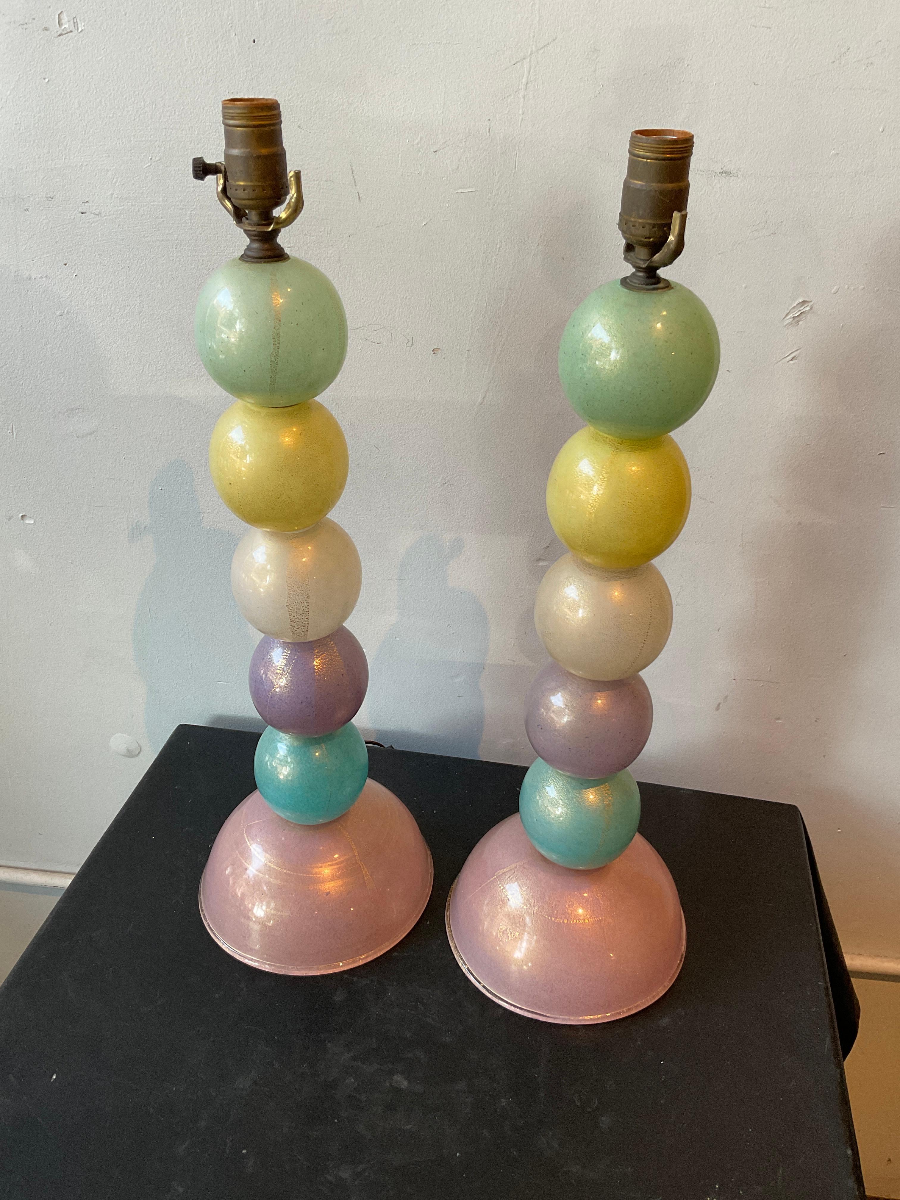 Pair of 1940s Barovier And Toso  multi color ball  Murano lamps. One lamps rod has a slight bend in it. Rod needs replacing , or bent back in place.Paper label that says Barovier and Toso.