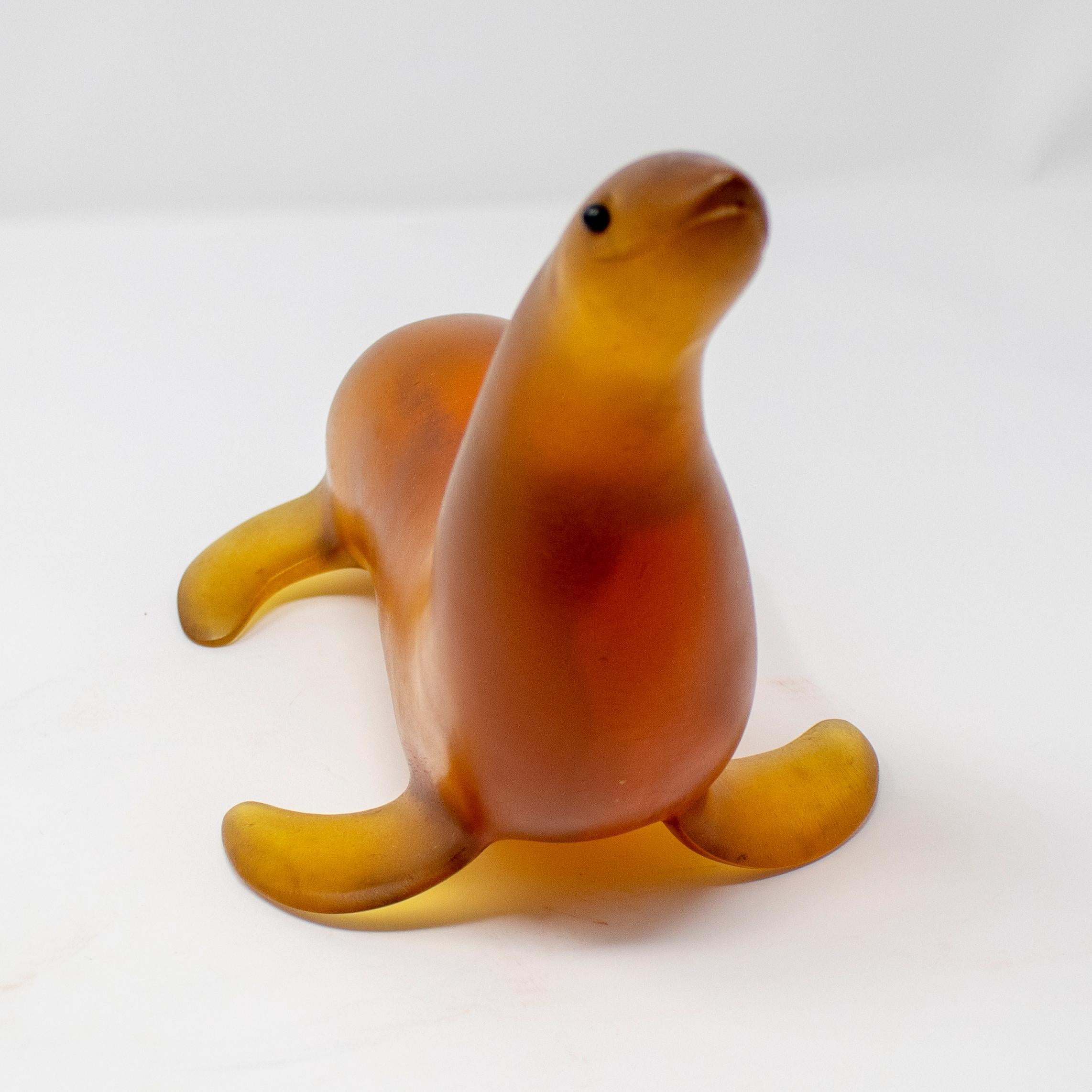 1940s signed walrus resin sculpture.