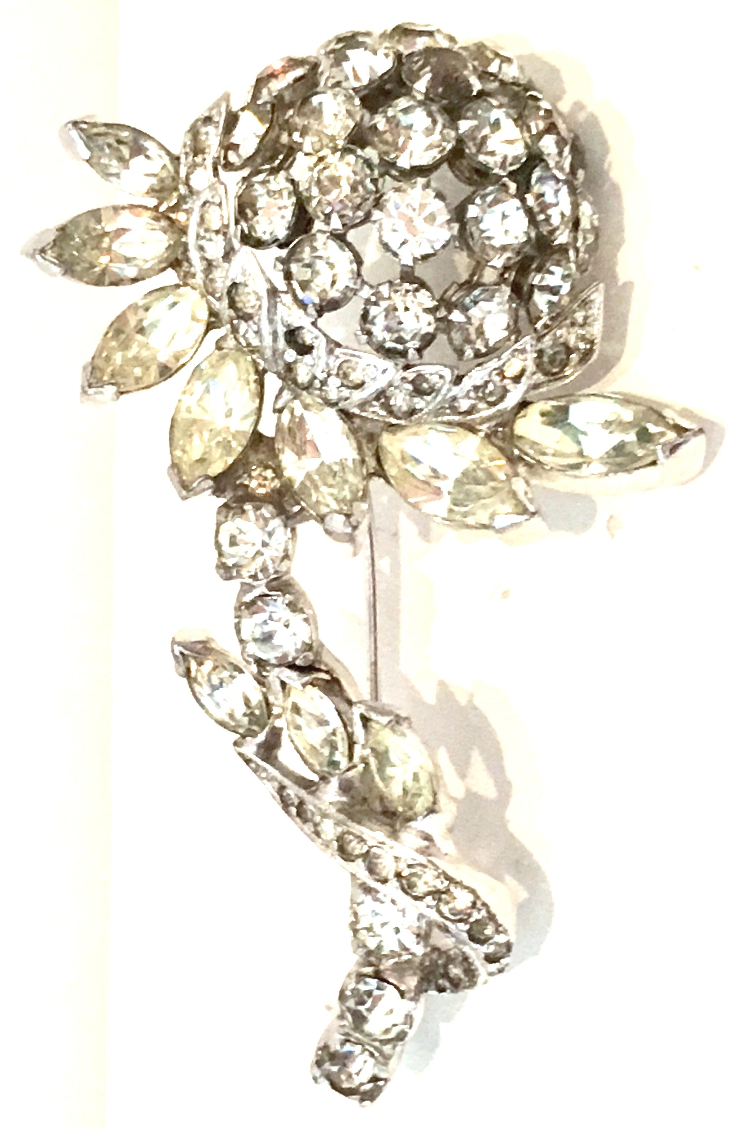 1940'S Silver Plate & Austrian Crystal Dimensional Flower Brooch By, Eisenberg. This finely crafted coveted and rare artisan piece features, brilliant prong set Austrian cut and faceted  colorless and yellow stones. The navette flower petals are