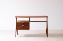 1940's Small elegant desk with extraordinary side uprights