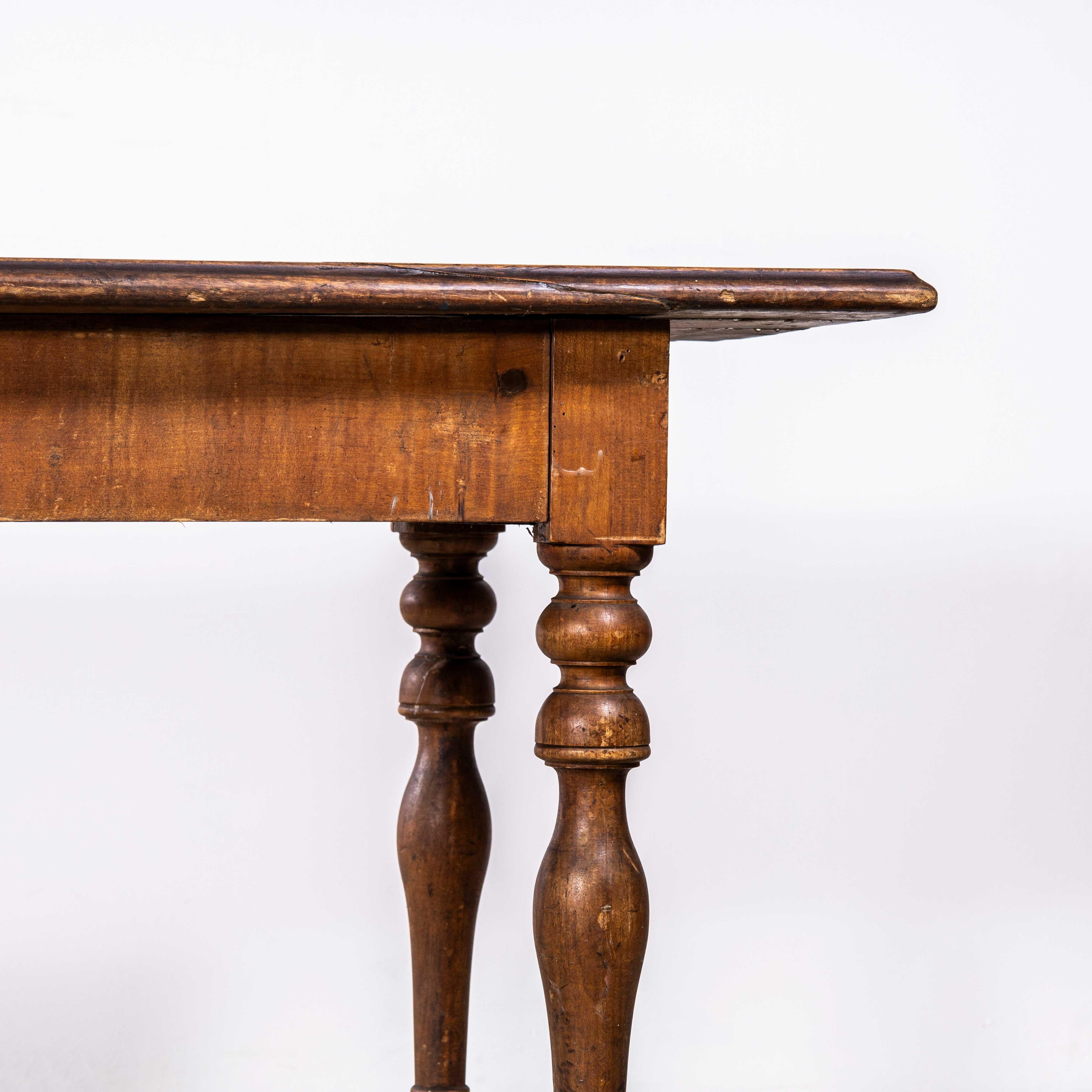 1940’s Small French Fruitwood Kitchen Dining Table. 

Compact sized original French table with a rich golden colour and character. Beautifully made in solid fruitwood throughout. The table is made with turned bobbin legs and good construction. Our