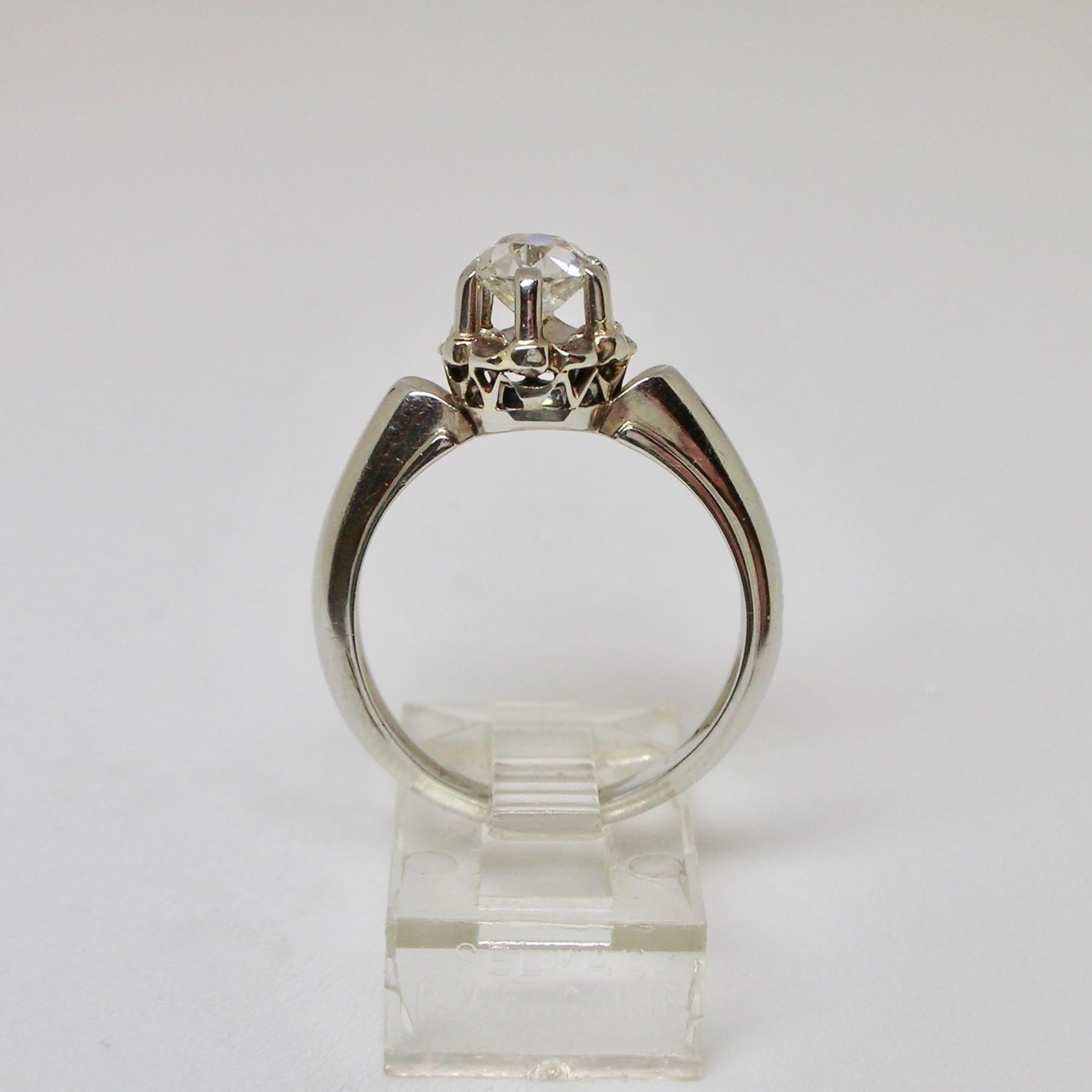 1940s solitaire engagement ring set in 18ct white gold with an old euro cut diamond of approximately 0.80ct, estimated colour J - K, estimated clarity VVS. The piece is stamped with a lictor's fasces indicating it was made in Italy between 1934 and