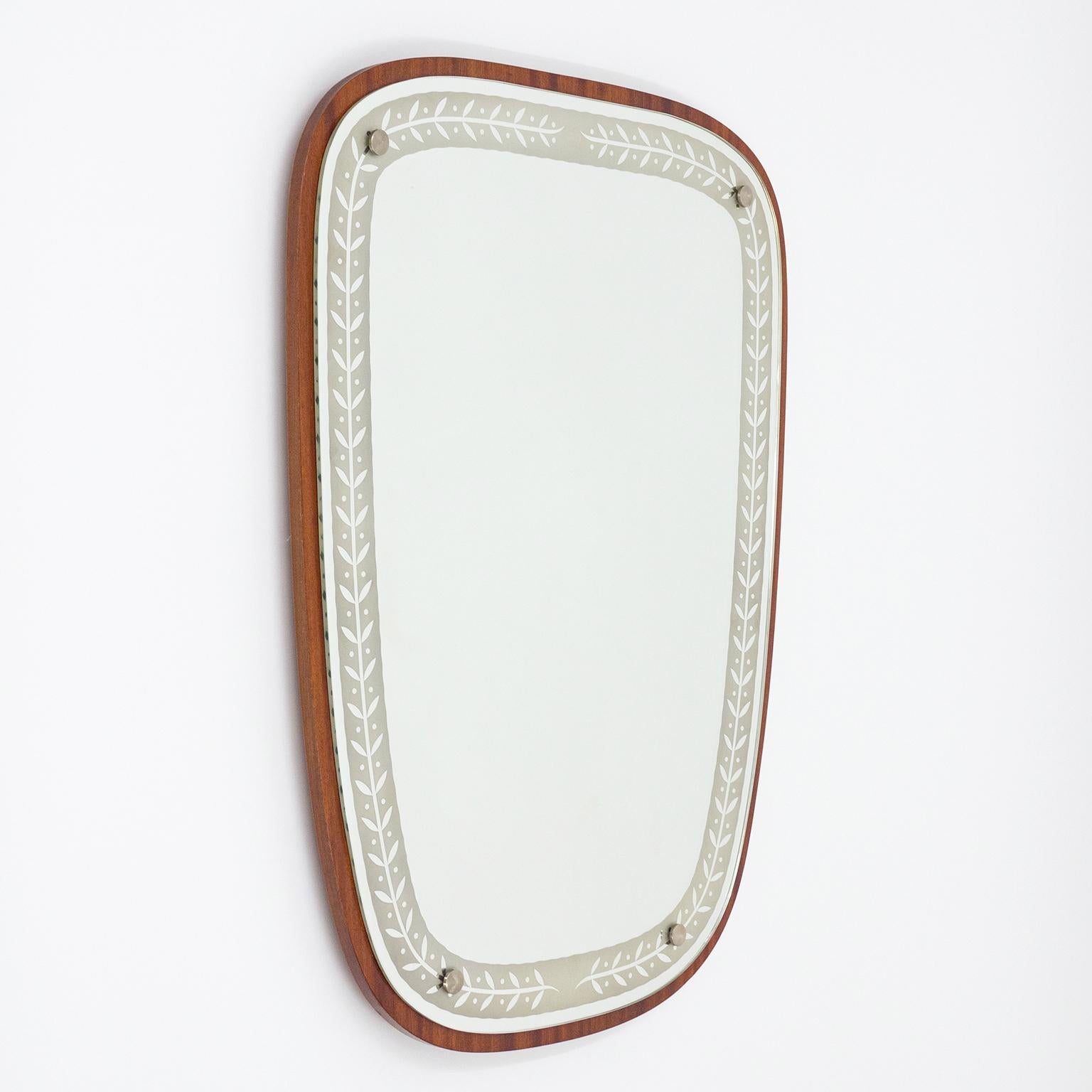 Lovely large Art Deco Mirror from Sweden, 1940s. A mahogany veneered backplate to which a mirror with etched border is attached with four nickeled knobs. Very good original condition with just minor ageing to the mirror.