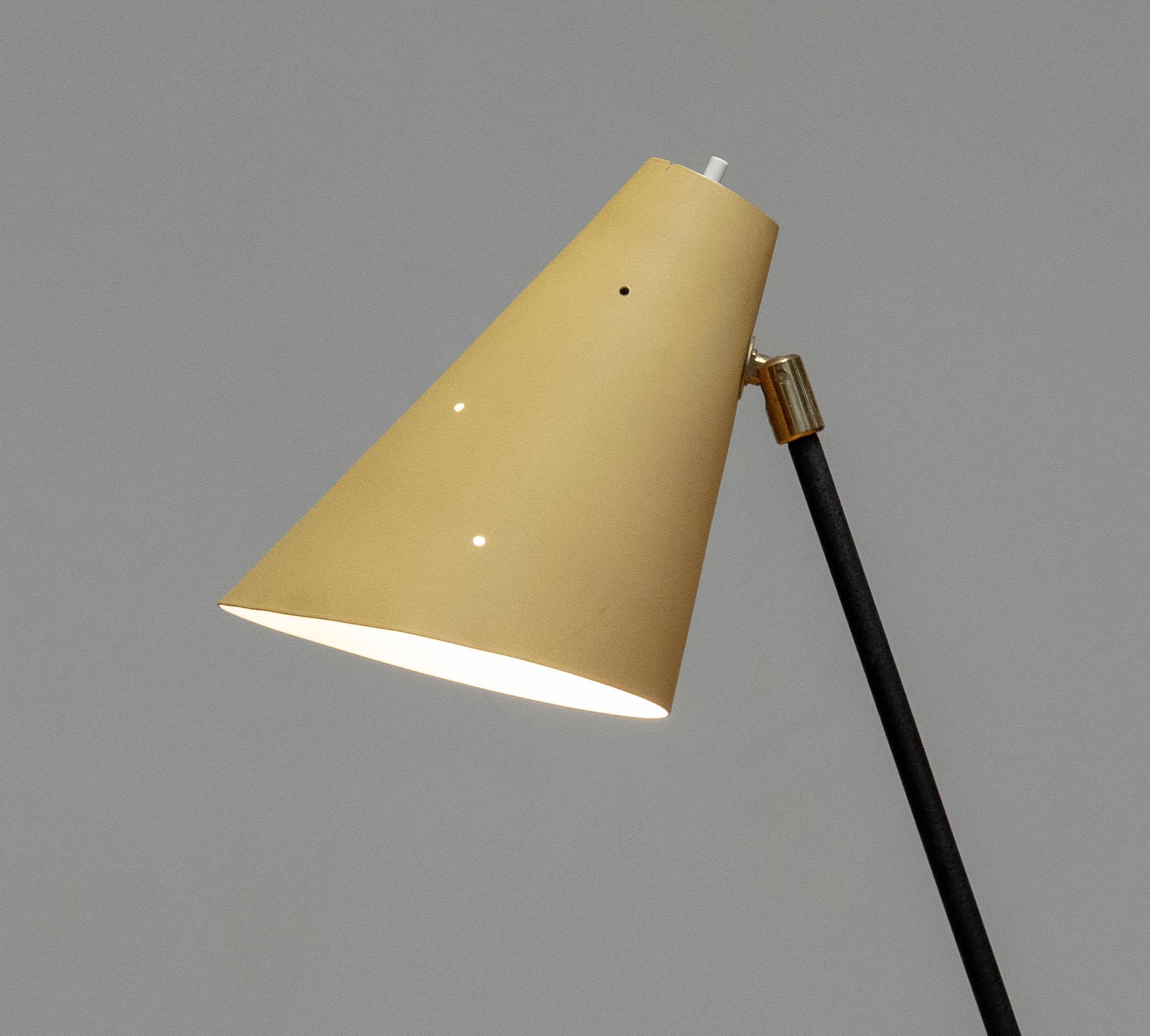 This rare and whimsical floor reading lamp from 1940s Sweden—often referred to as a grasshopper or giraffe lamp due to its distinctive posture and long, elegant neck—is a striking example of early Scandinavian functionalism paired with playful