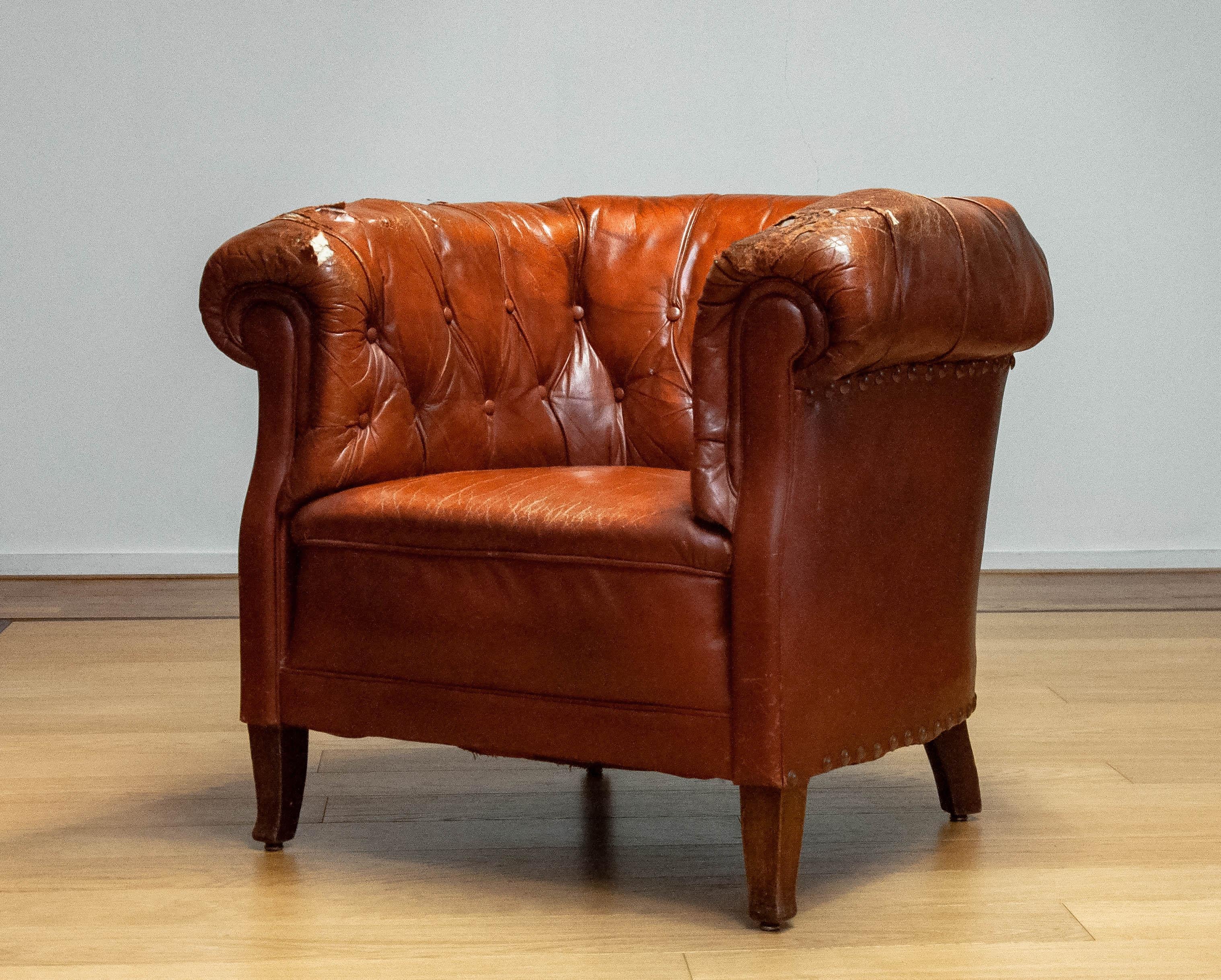 tufted leather club chair