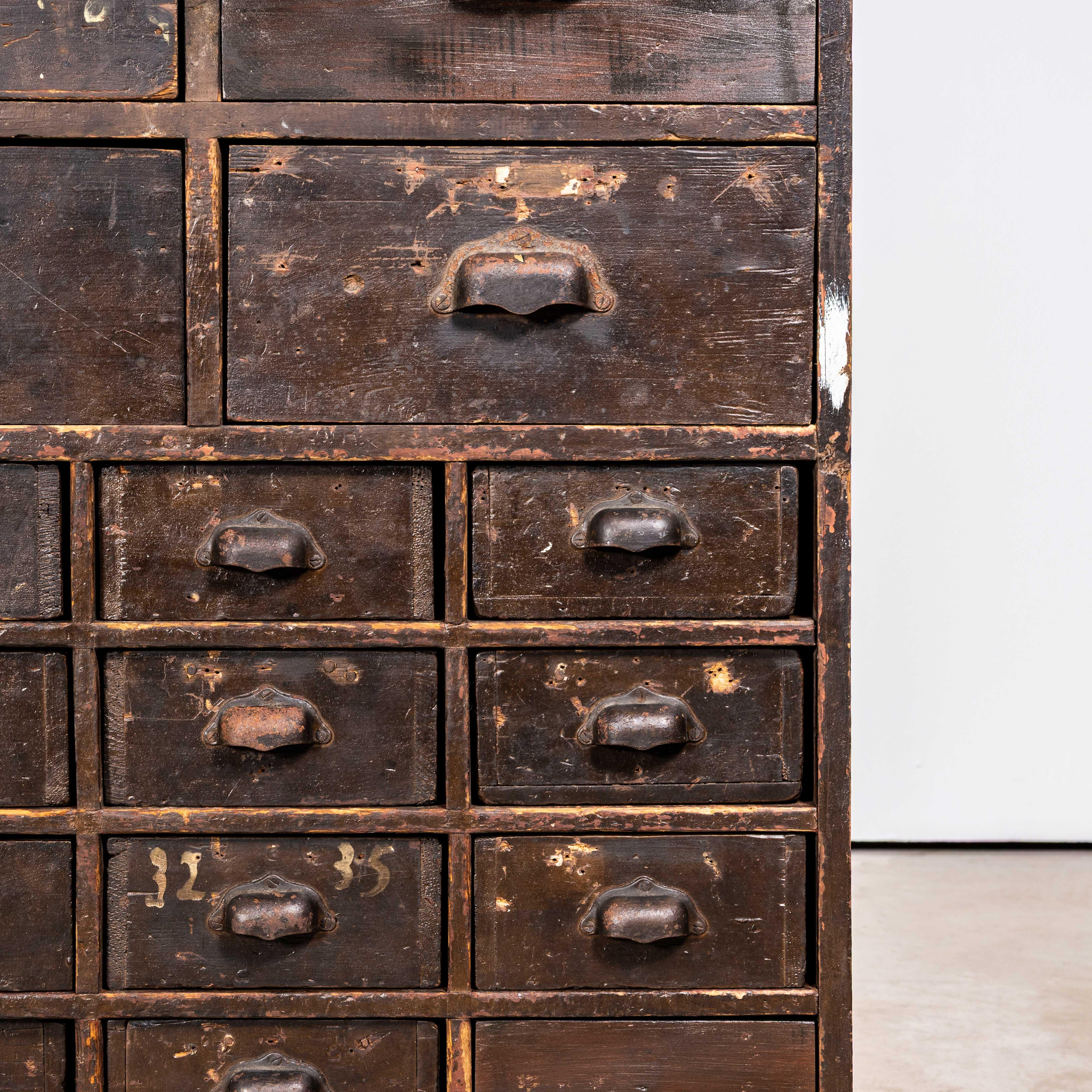 1940's Tall French Workshop Shelving Unit - Thirty Four Drawers In Good Condition For Sale In Hook, Hampshire