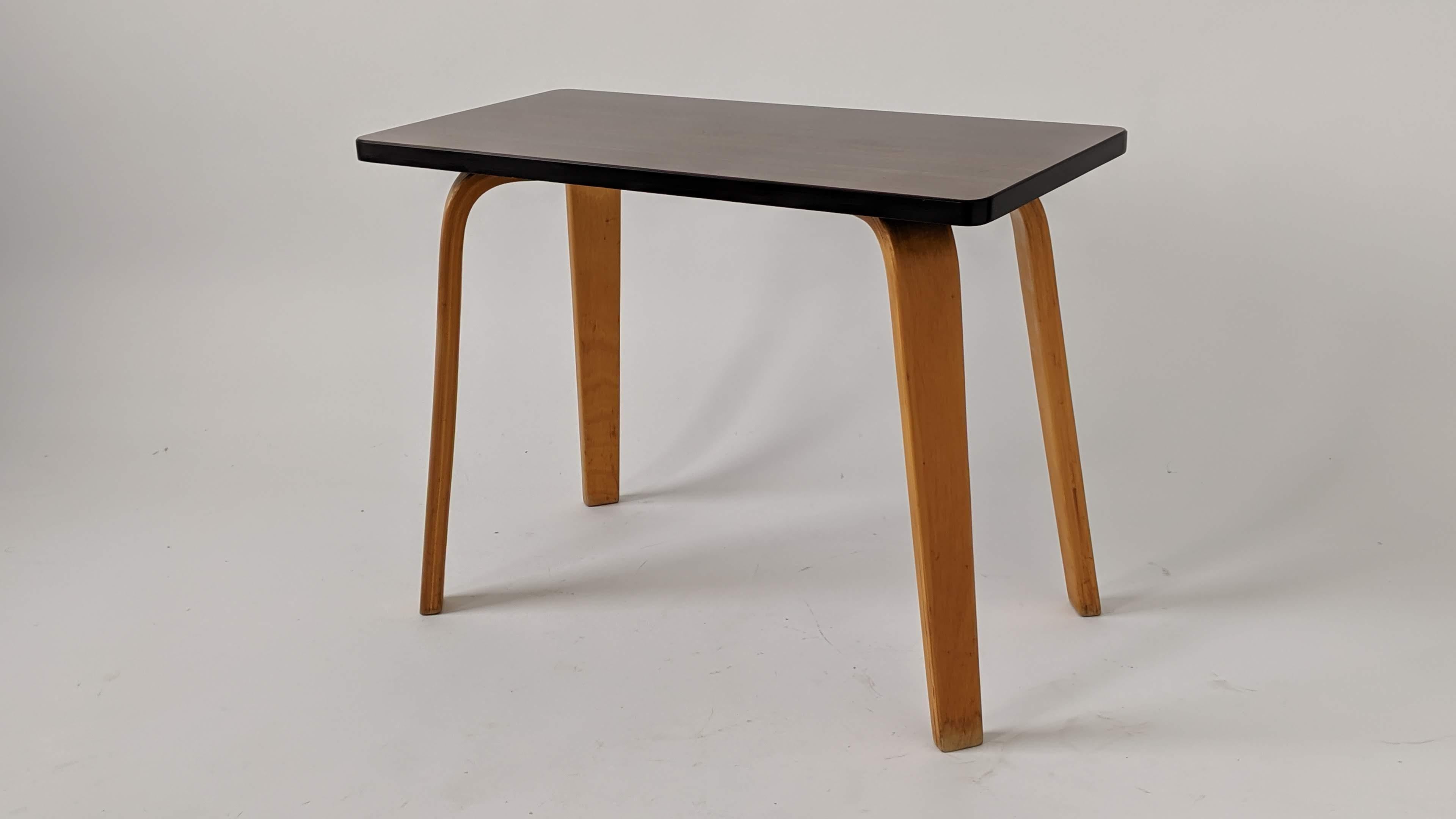 Rare Thonet \ Alvar Aalto side table with formica wood grain finish on thick  heavy bakelite base . 

Take note of angled leg assembly.

Lacquered maple bentwood legs. 

Well made with solid sturdy material and construction.