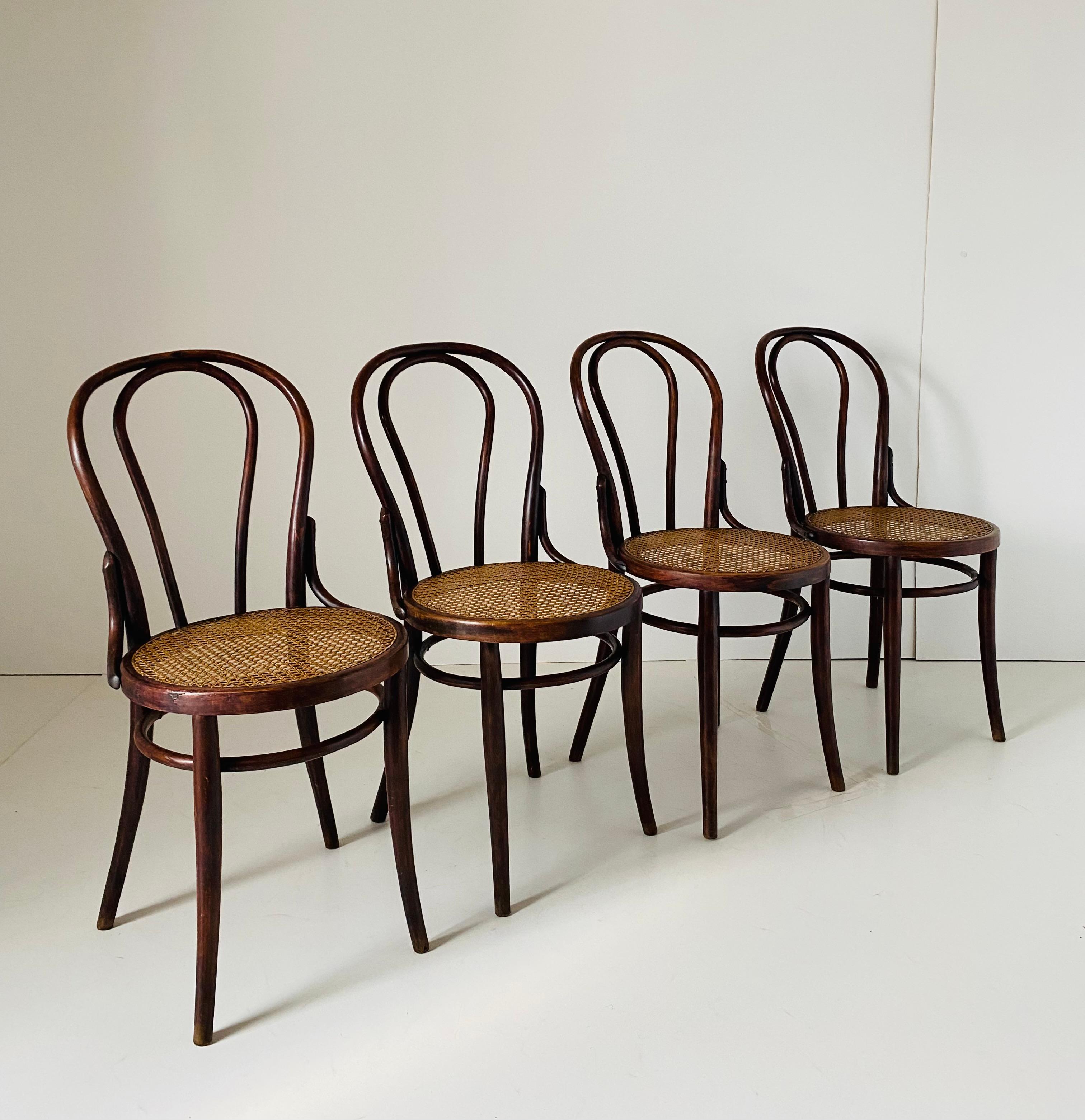 Set of four Thonet style dining chairs manufactured by 