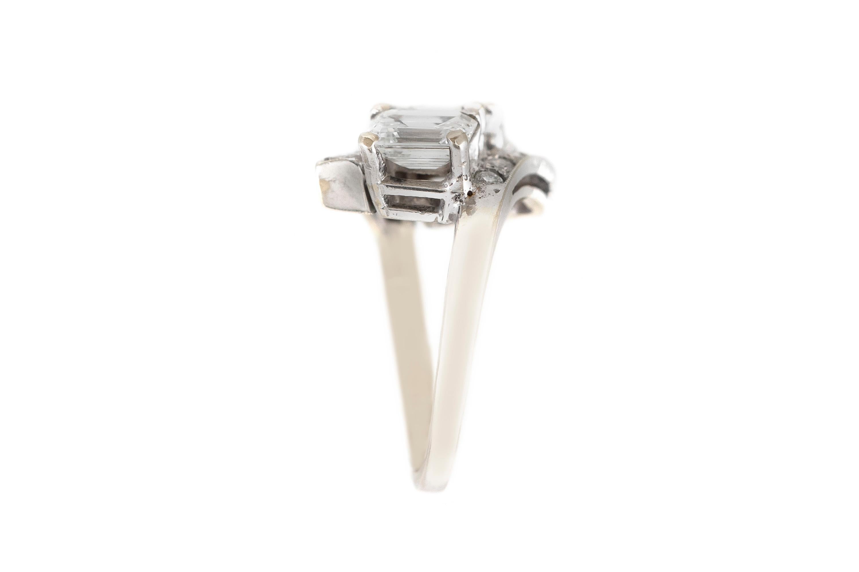 The ring is finely crafted in platinum with diamonds emerald cut weighing approximately total of 3.00 carat .
Color G-H     Clarity VS
 Round diamonds weighing approximately total of 0.45 carat.
Size 6.00 ( easy to resize )
Circa 1930.